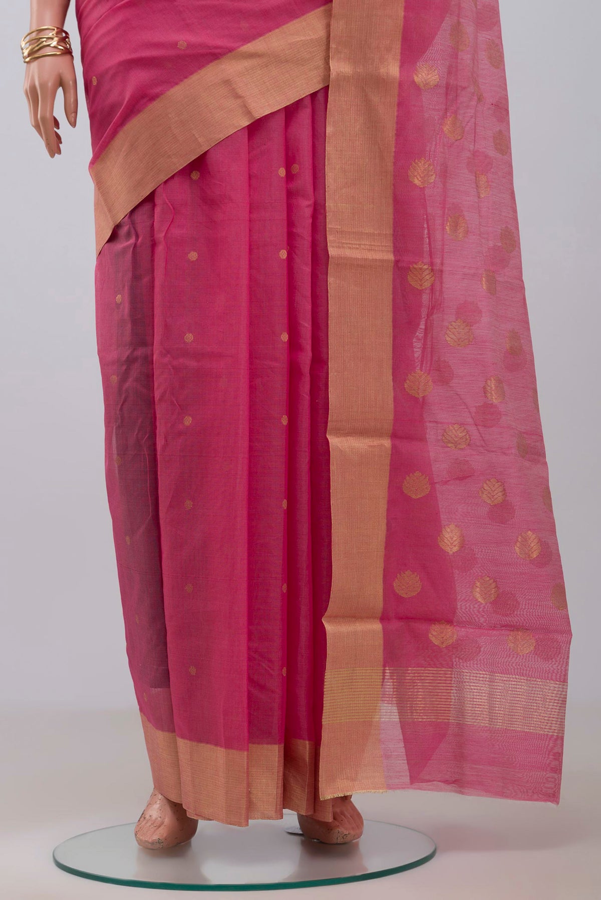 Pleats and pallu of Pink Chanderi Silk Cotton Saree with Zari Butta on the body and Zari Border. 