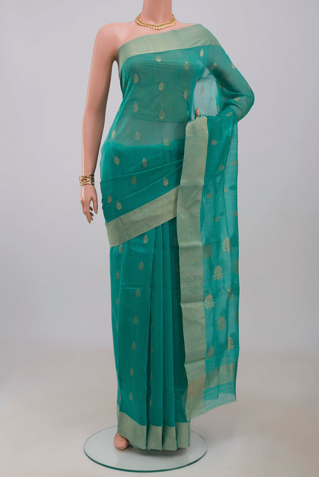 Blue Chanderi Silk Cotton Saree with Zari Butta on the body and Zari Border.  displayed on a mannequin