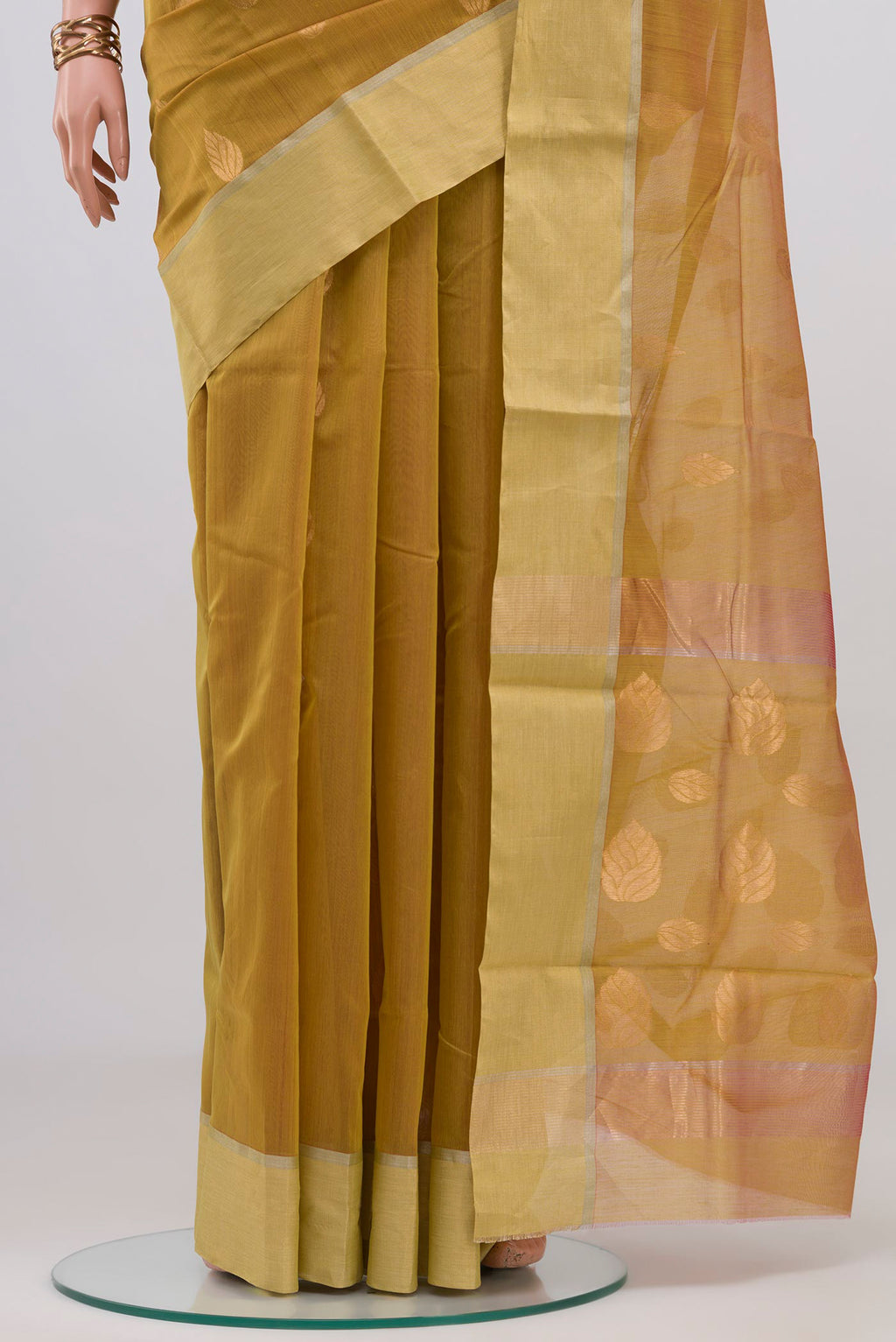Pleats and pallu of Lemon Yellow Chanderi Silk Cotton Saree with Zari Butta on the body and Zari Border. 