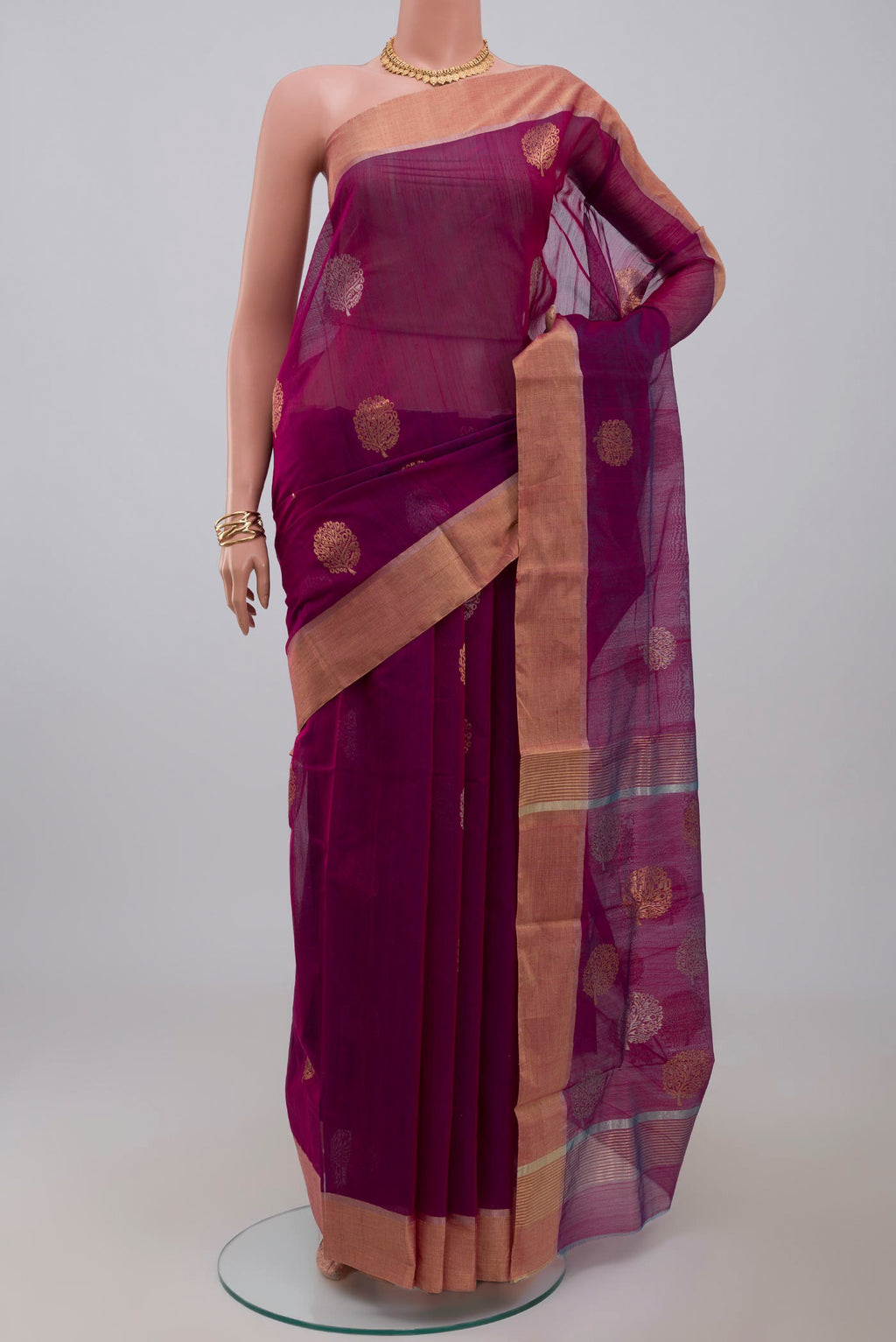 Purple Chanderi Silk Cotton Saree with Zari Butta on the body and Zari Border.  displayed on a mannequin