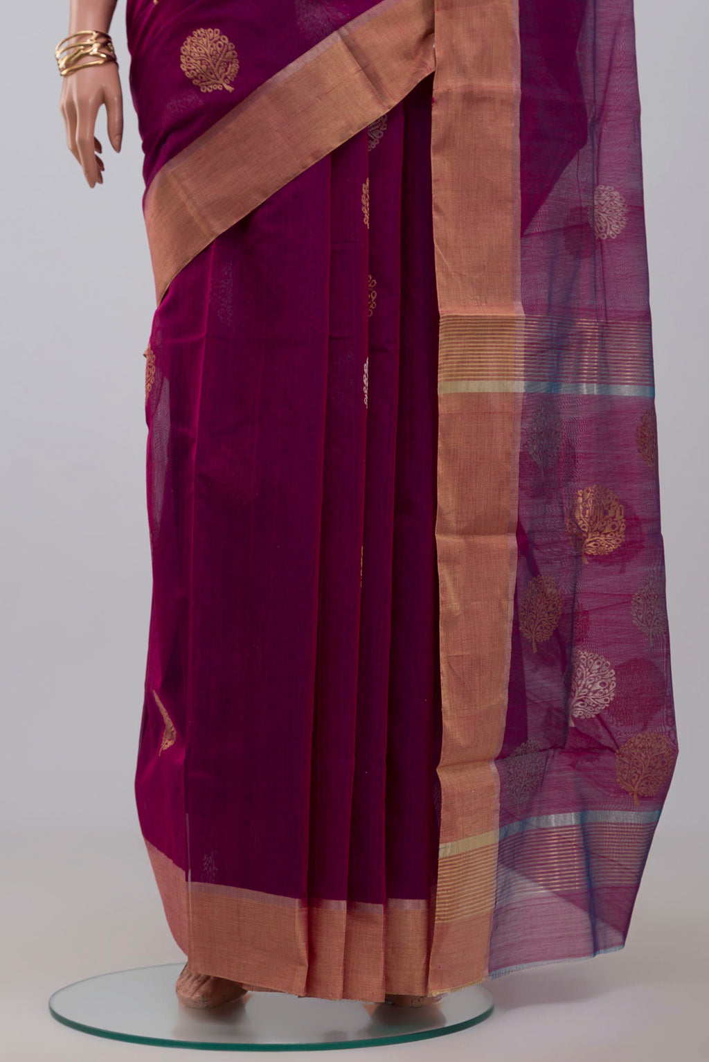 Pleats and pallu of Purple Chanderi Silk Cotton Saree with Zari Butta on the body and Zari Border. 