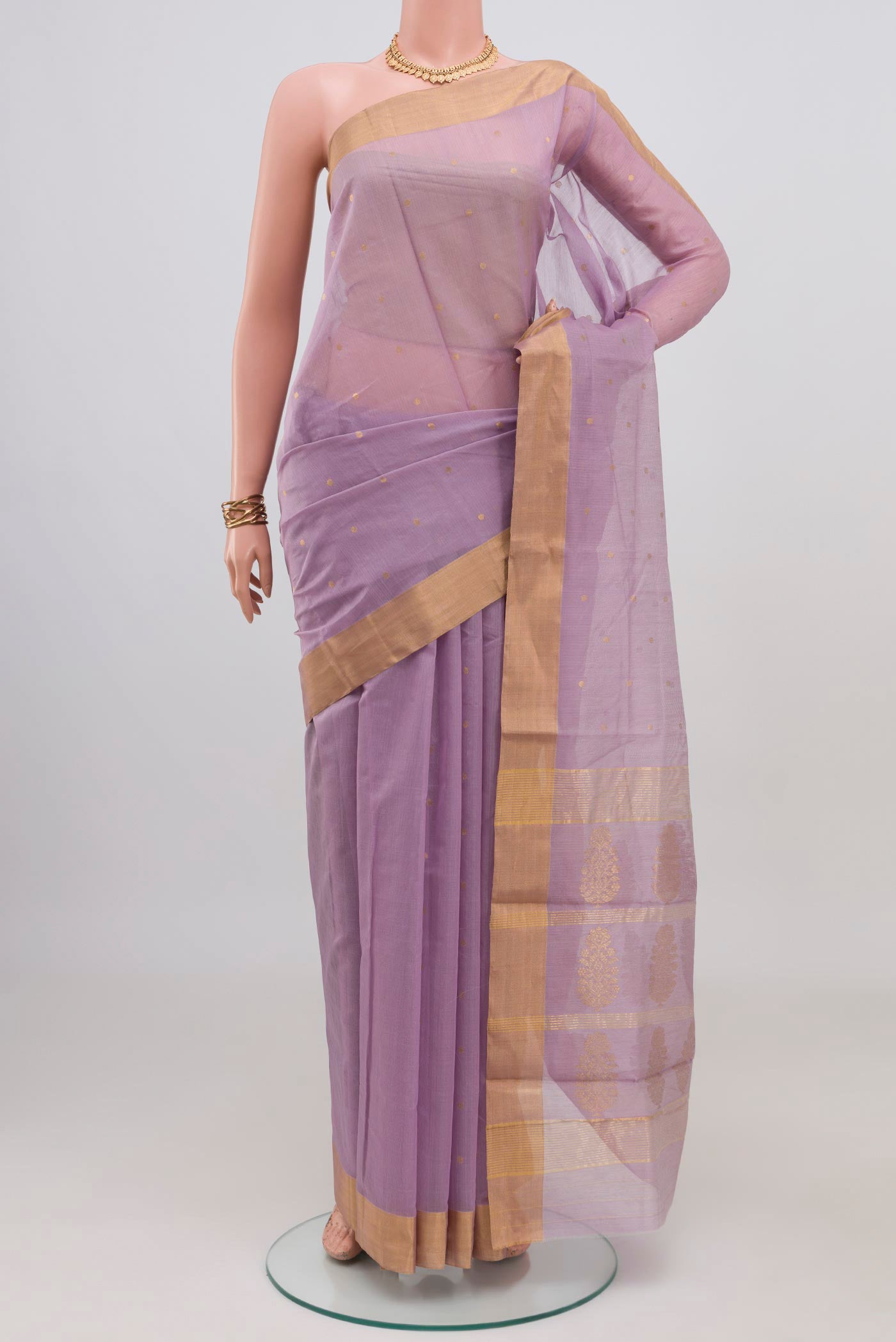 Lavender Chanderi Silk Cotton Saree with Zari Butta on the body and Zari Border.  displayed on a mannequin