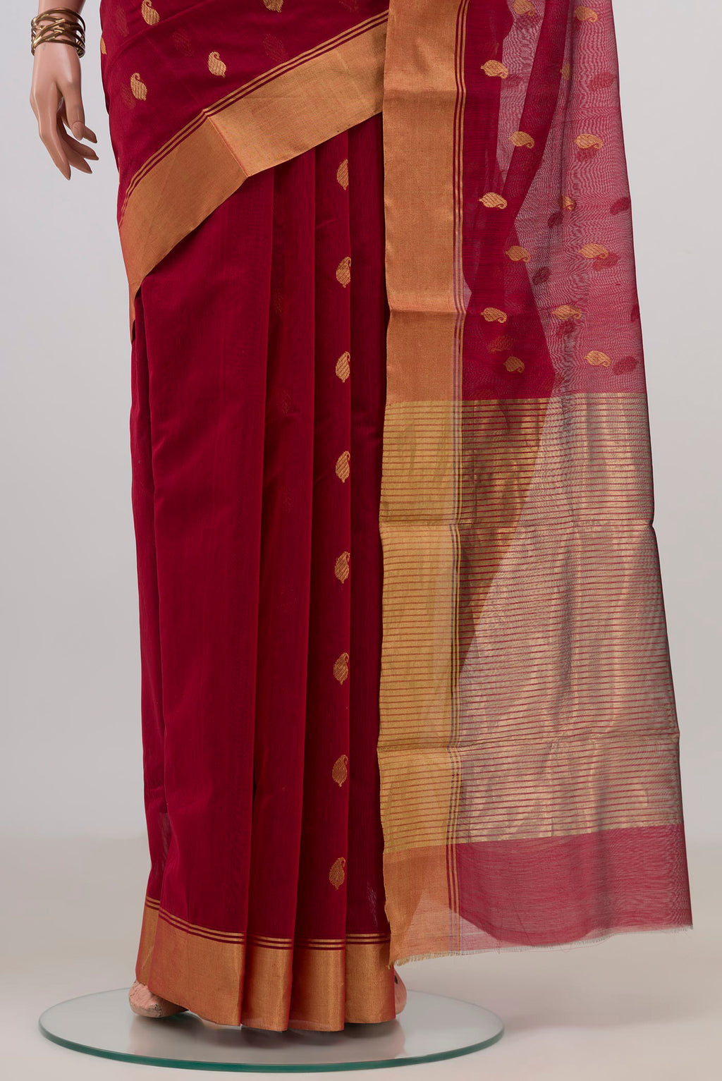 Pleats and pallu of Maroon Chanderi Cotton Saree with Zari Butta on the body and Zari Border. 