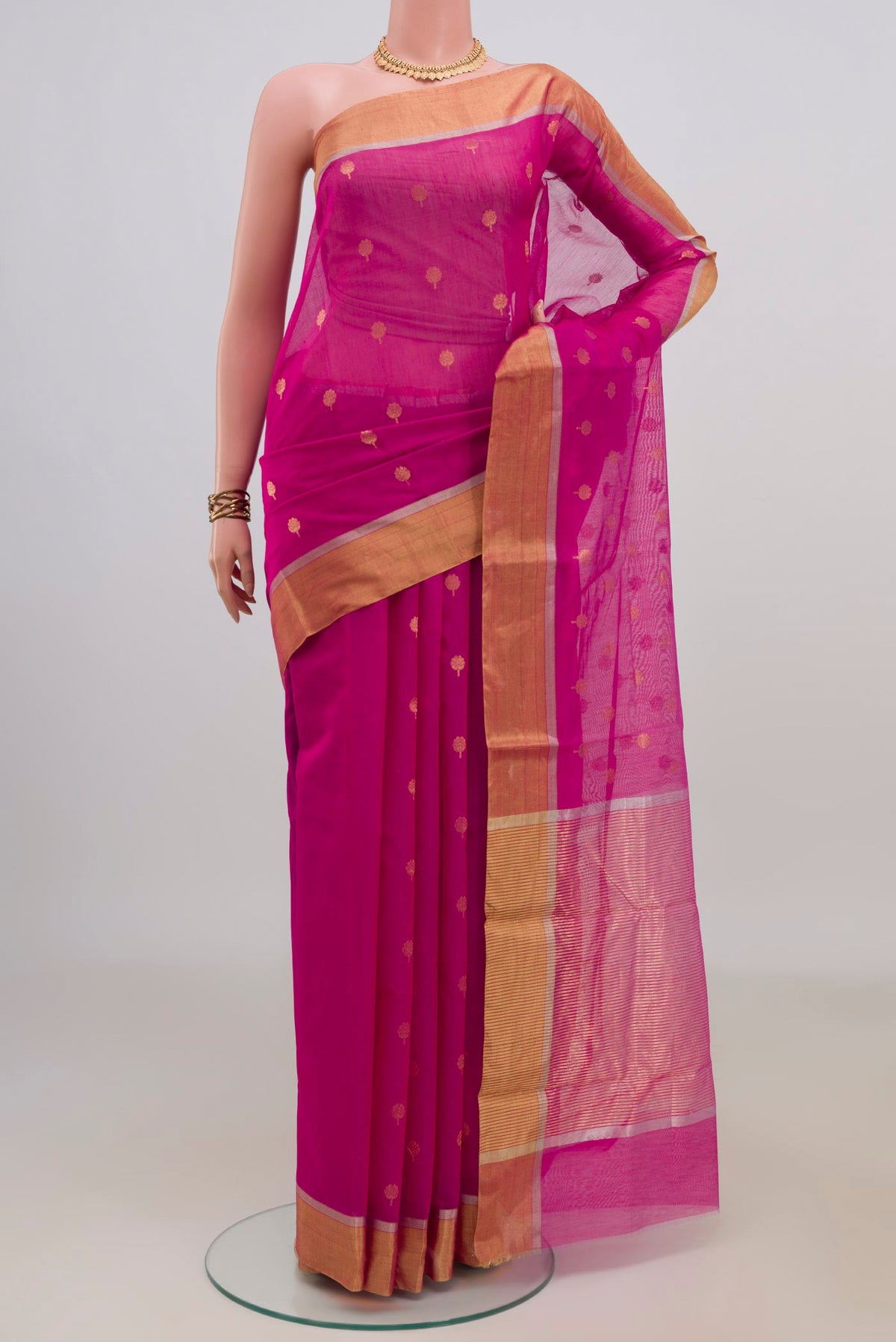 Pink Chanderi Cotton Saree with Zari Butta on the body and Zari Border.  displayed on a mannequin
