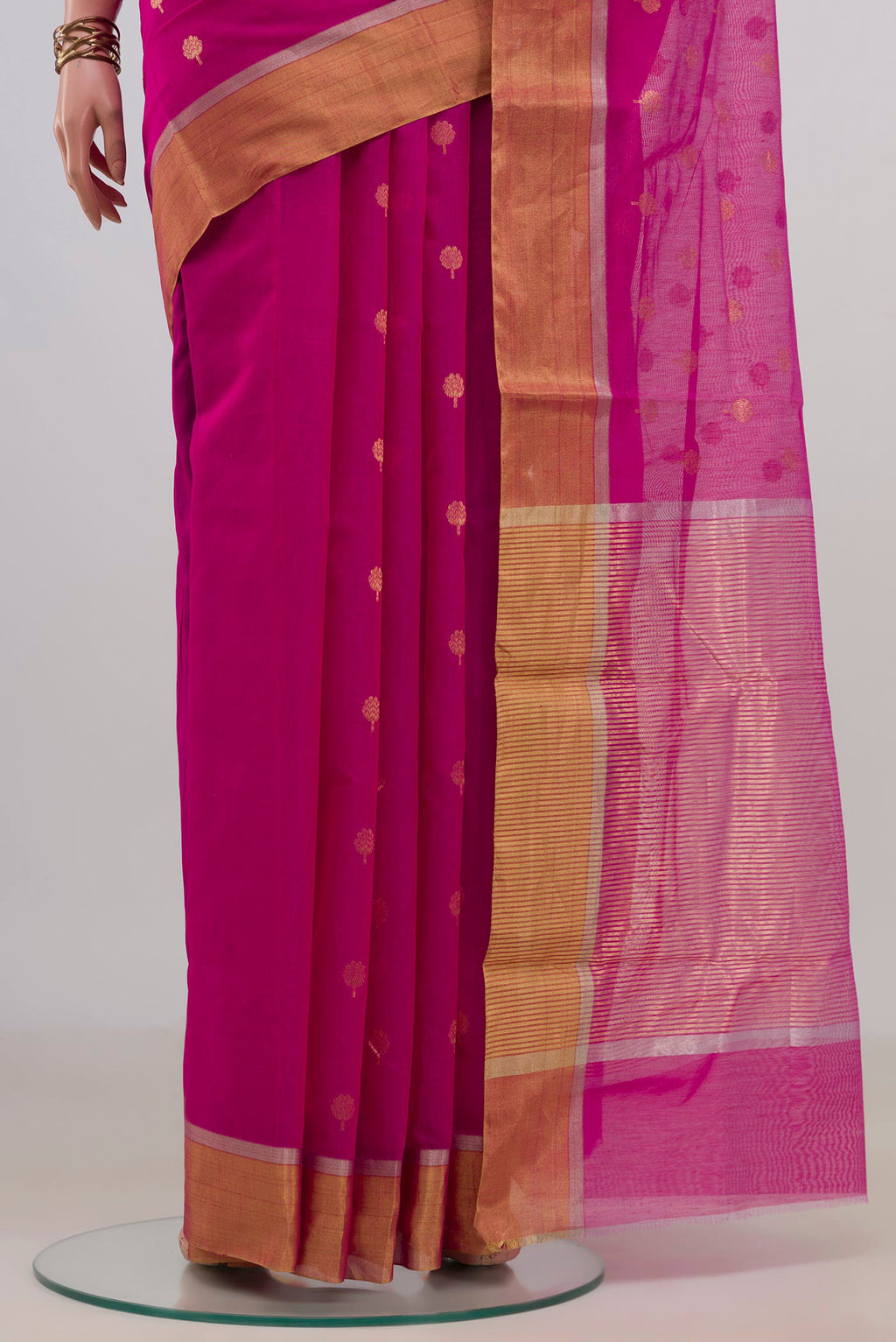 Pleats and pallu of Pink Chanderi Cotton Saree with Zari Butta on the body and Zari Border. 