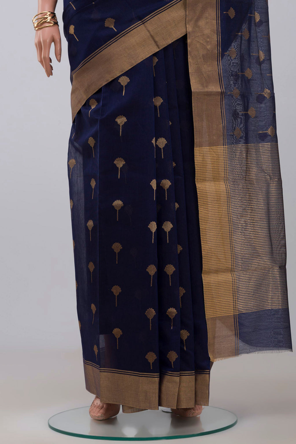 Pleats and pallu of Navy Blue Chanderi Silk Cotton Saree with Zari Butta on the body and Zari Border. 