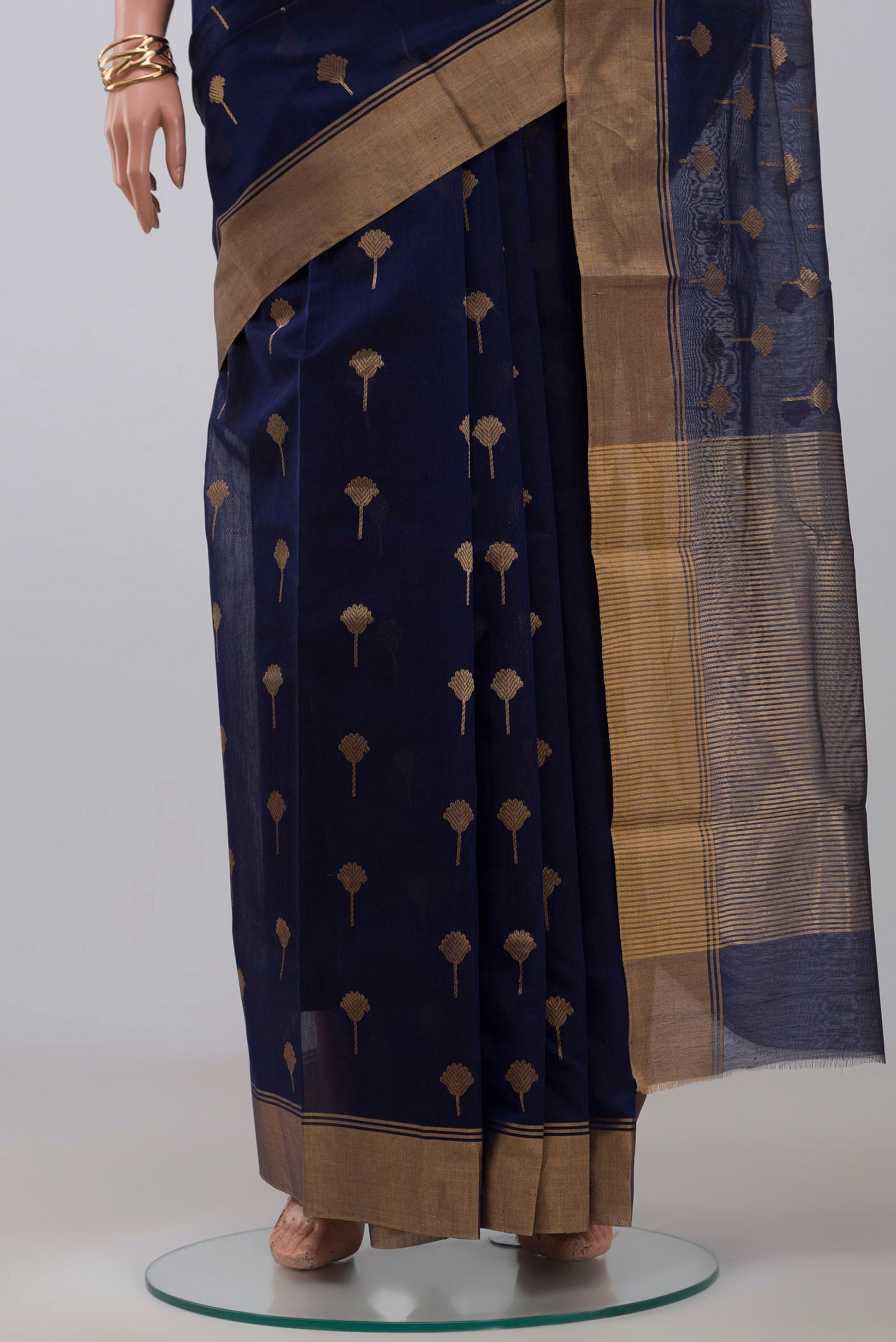 Pleats and pallu of Navy Blue Chanderi Silk Cotton Saree with Zari Butta on the body and Zari Border. 