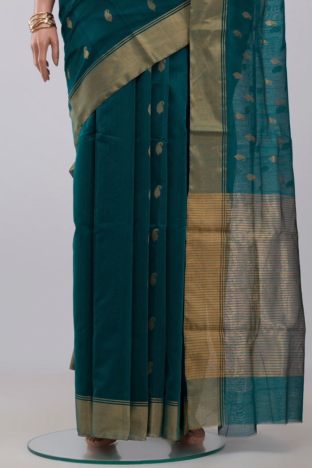 Pleats and pallu of Green Chanderi Silk Cotton Saree with Zari Butta on the body and Zari Border. 
