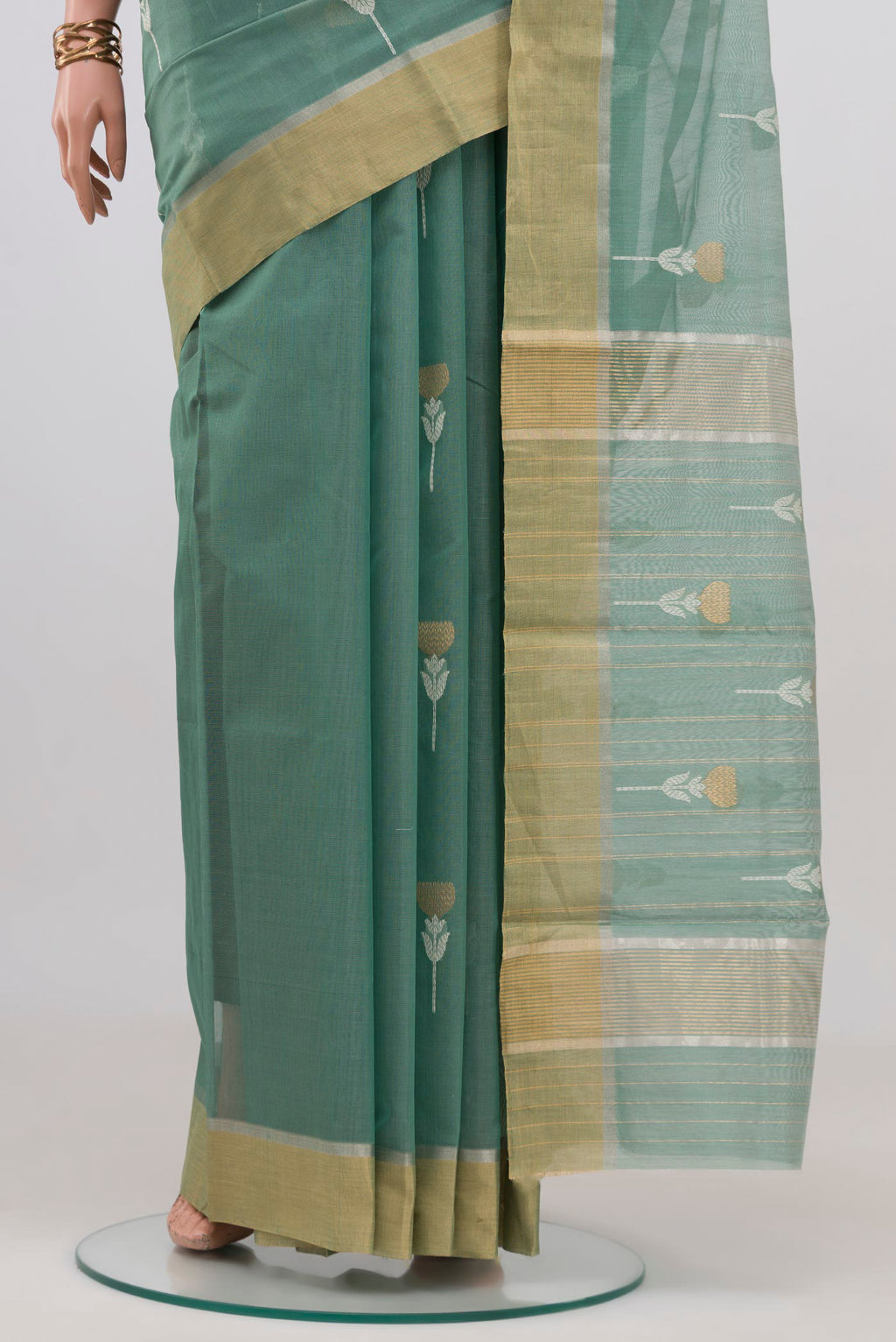 Pleats and pallu of Sage Green Chanderi Silk Cotton Saree with Zari Butta on the body and Zari Border. 