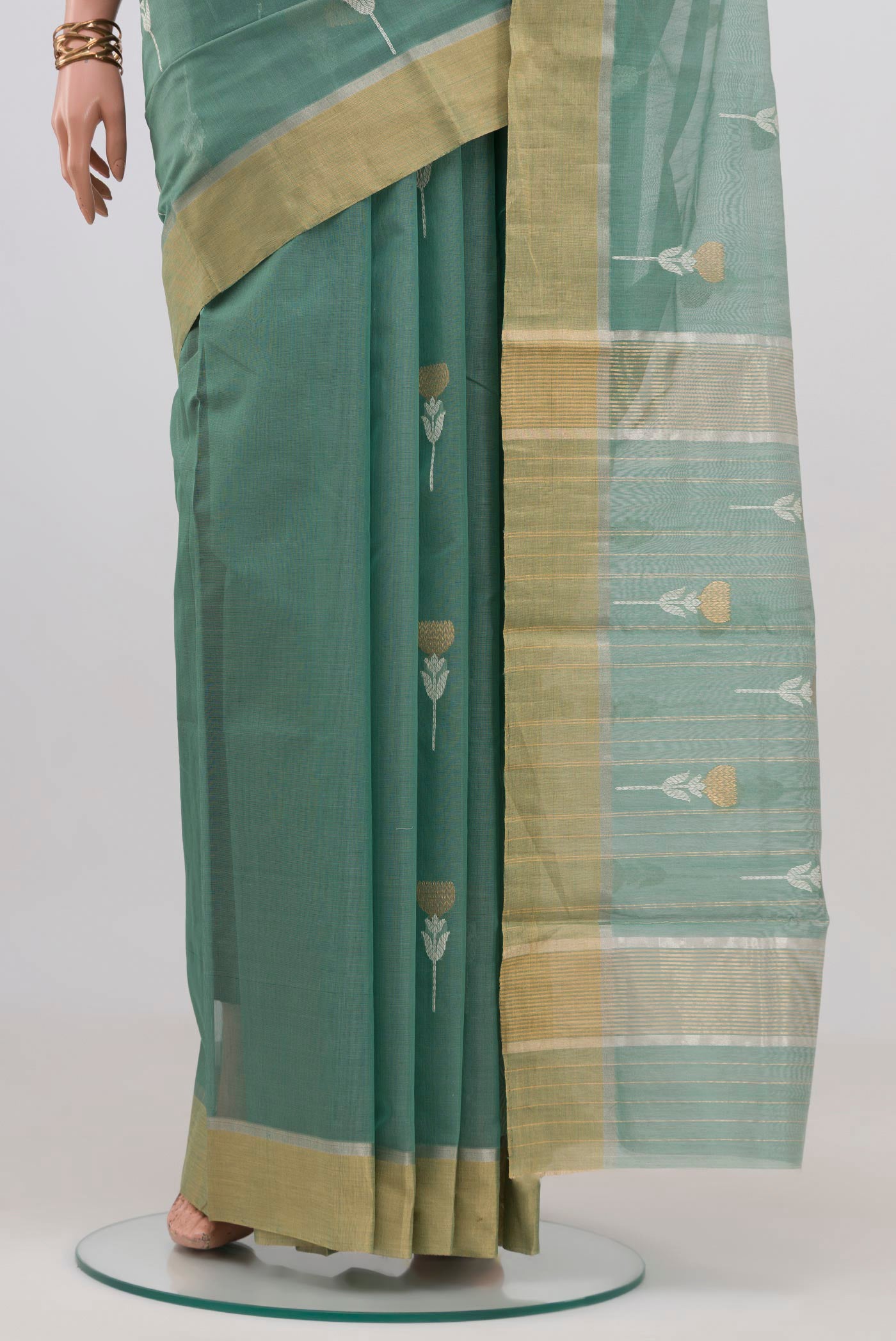 Pleats and pallu of Sage Green Chanderi Silk Cotton Saree with Zari Butta on the body and Zari Border. 