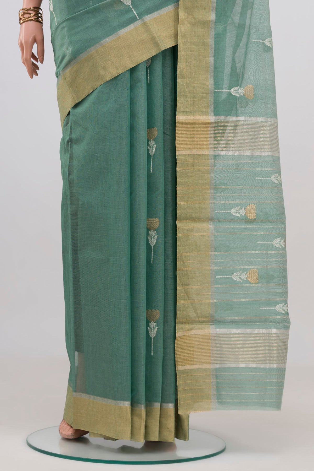 Pleats and pallu of Sage Green Chanderi Silk Cotton Saree with Zari Butta on the body and Zari Border. 