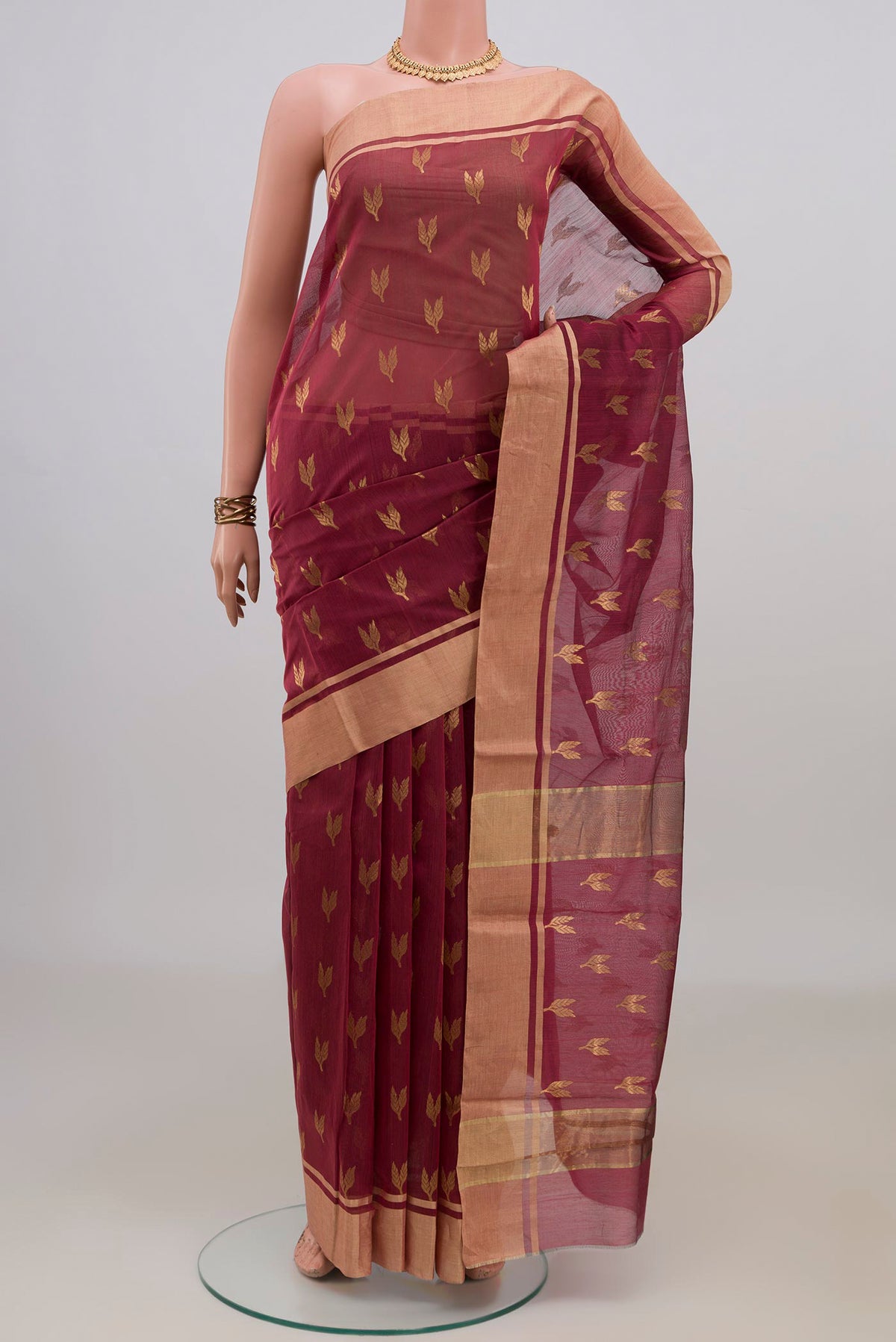 Pink Chanderi Cotton Saree with Zari Butta on the body and Zari Border.  displayed on a mannequin