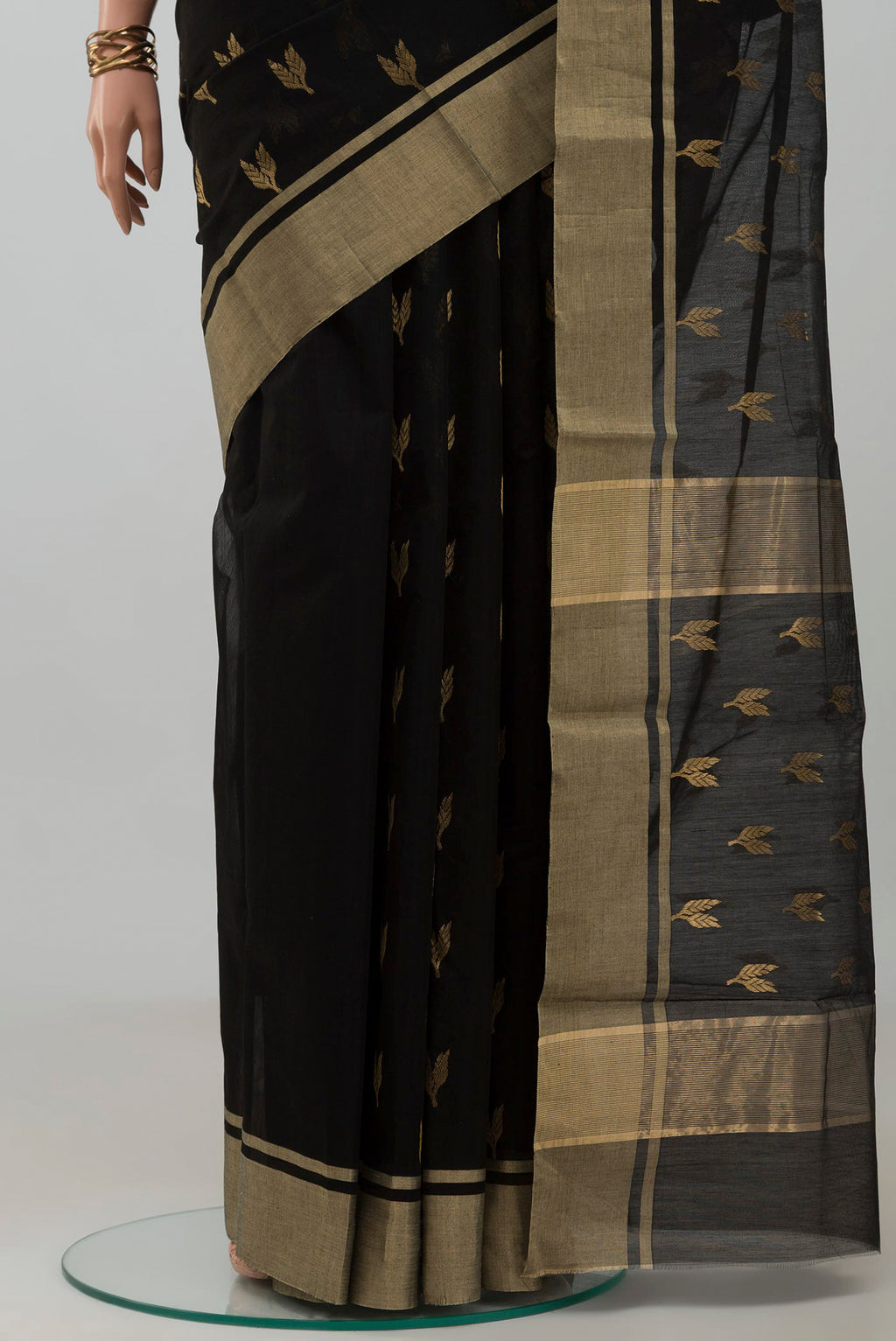 Pleats and pallu of Black Chanderi Silk Cotton Saree with Zari Butta on the body and Zari Border. 
