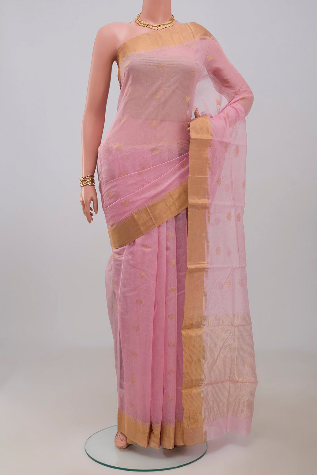 Pink Chanderi Silk Cotton Saree with Zari Butta on the body and Zari Border.  displayed on a mannequin