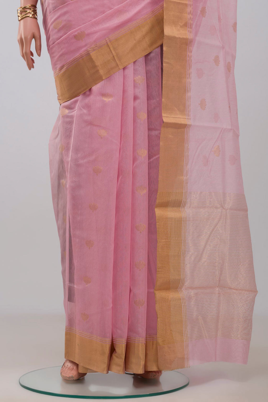 Pleats and pallu of Pink Chanderi Silk Cotton Saree with Zari Butta on the body and Zari Border. 