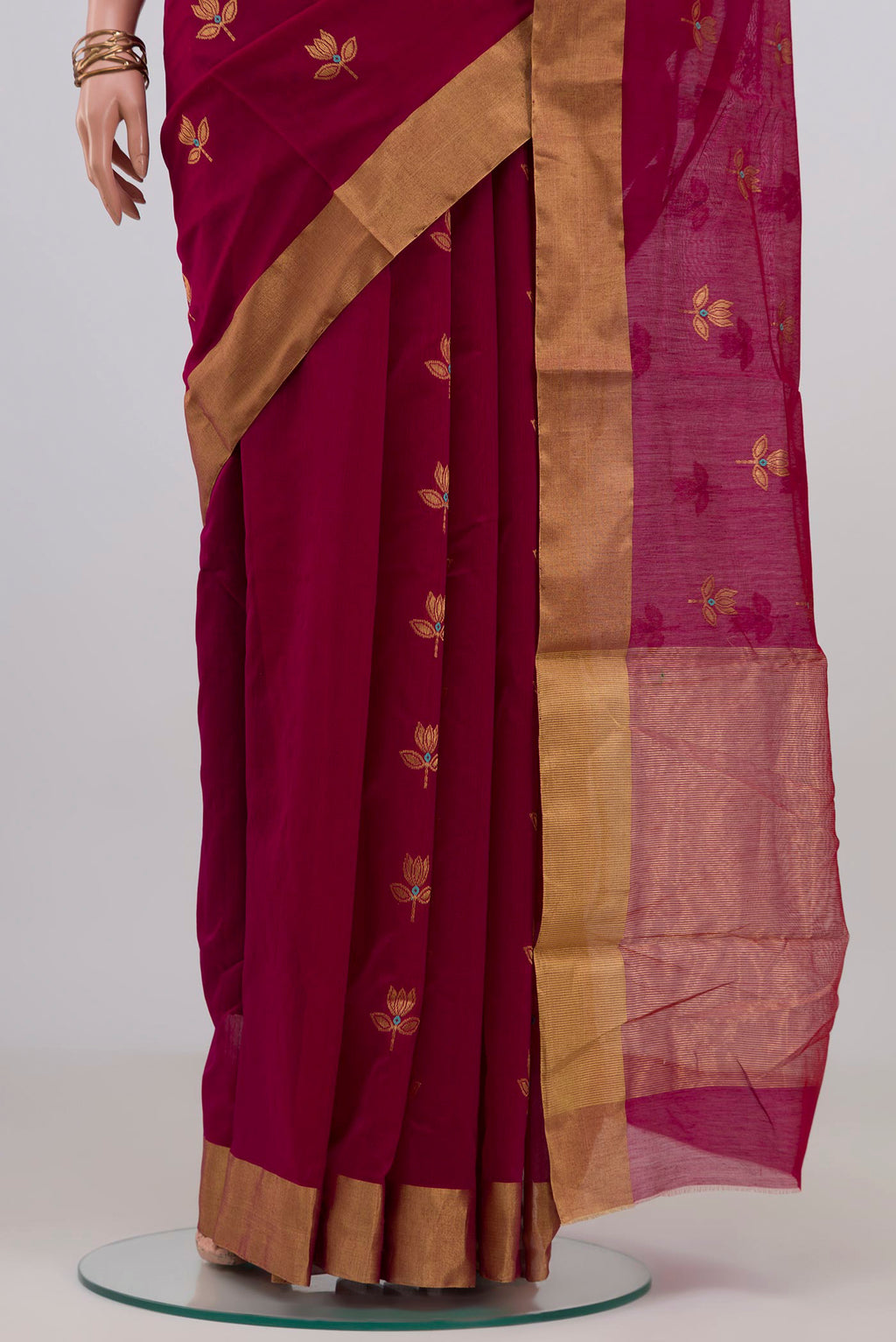 Pleats and pallu of Maroon Chanderi Silk Cotton Saree with Zari Butta on the body and Zari Border. 