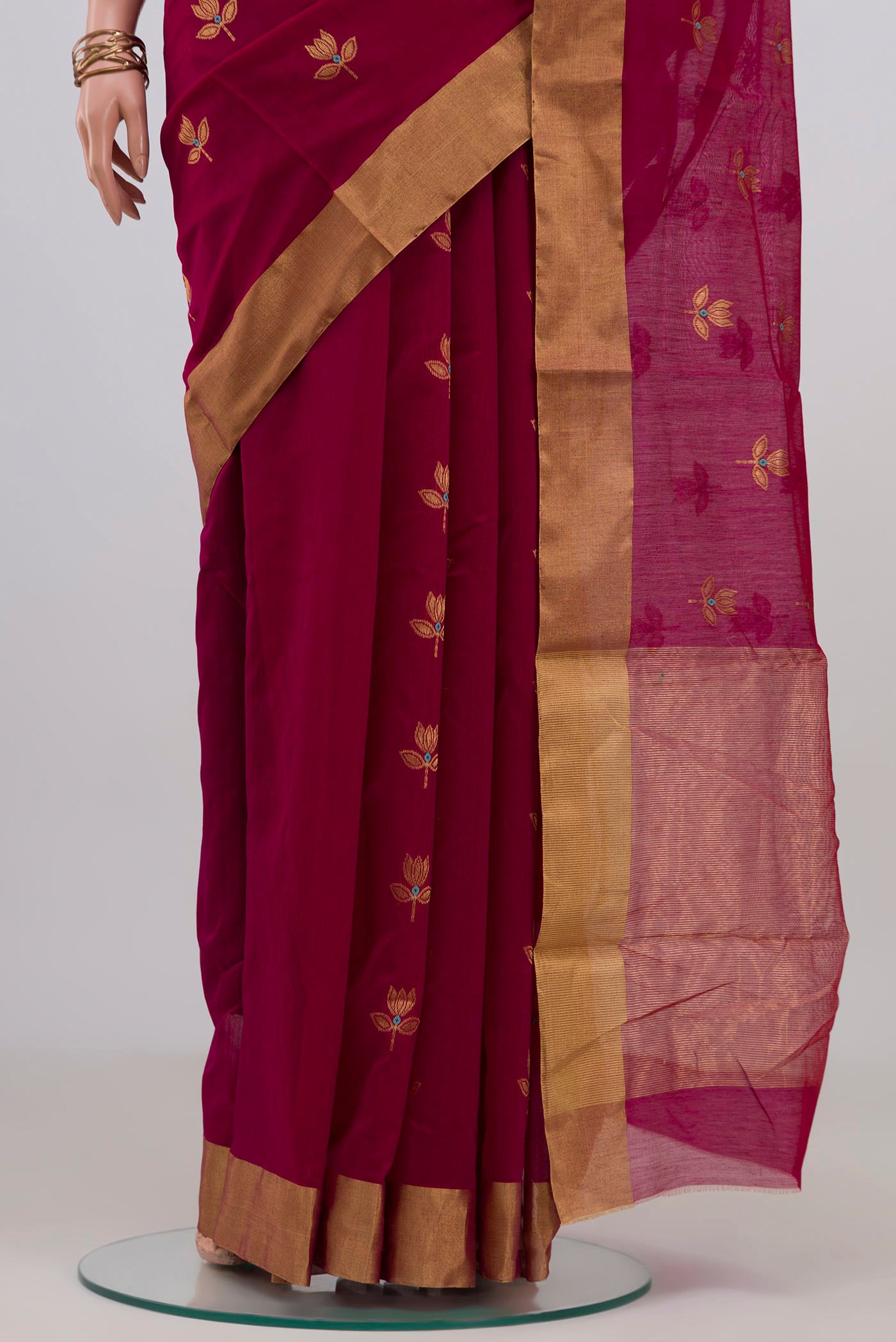 Pleats and pallu of Maroon Chanderi Silk Cotton Saree with Zari Butta on the body and Zari Border. 
