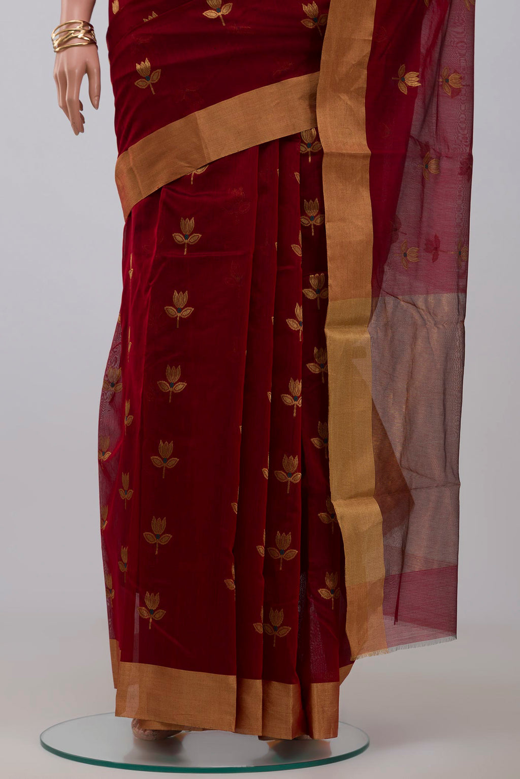 Pleats and pallu of Red Chanderi Silk Cotton Saree with Zari Butta on the body and Zari Border. 