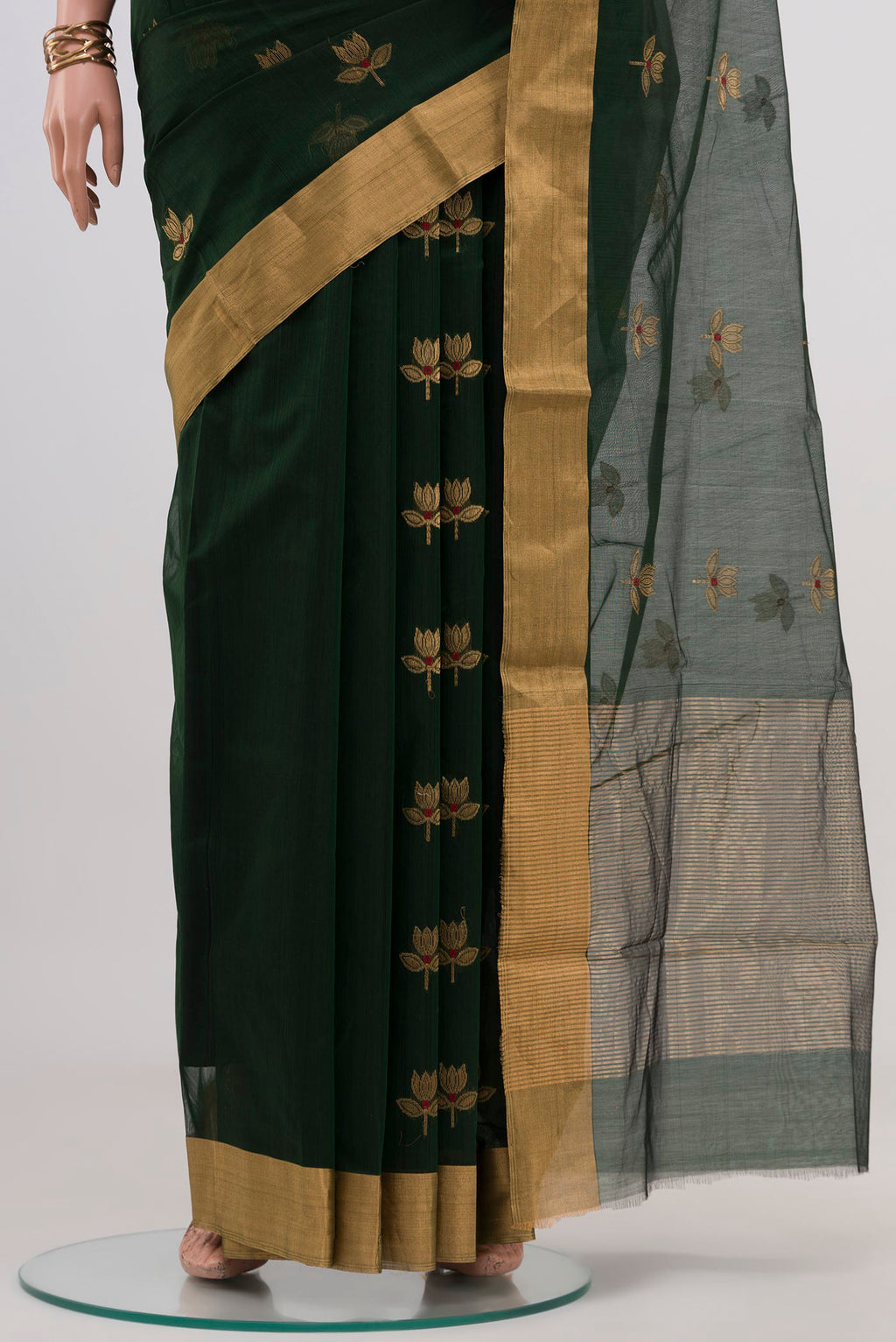 Pleats and pallu of Green Chanderi Silk Cotton Saree with Zari Butta on the body and Zari Border. 