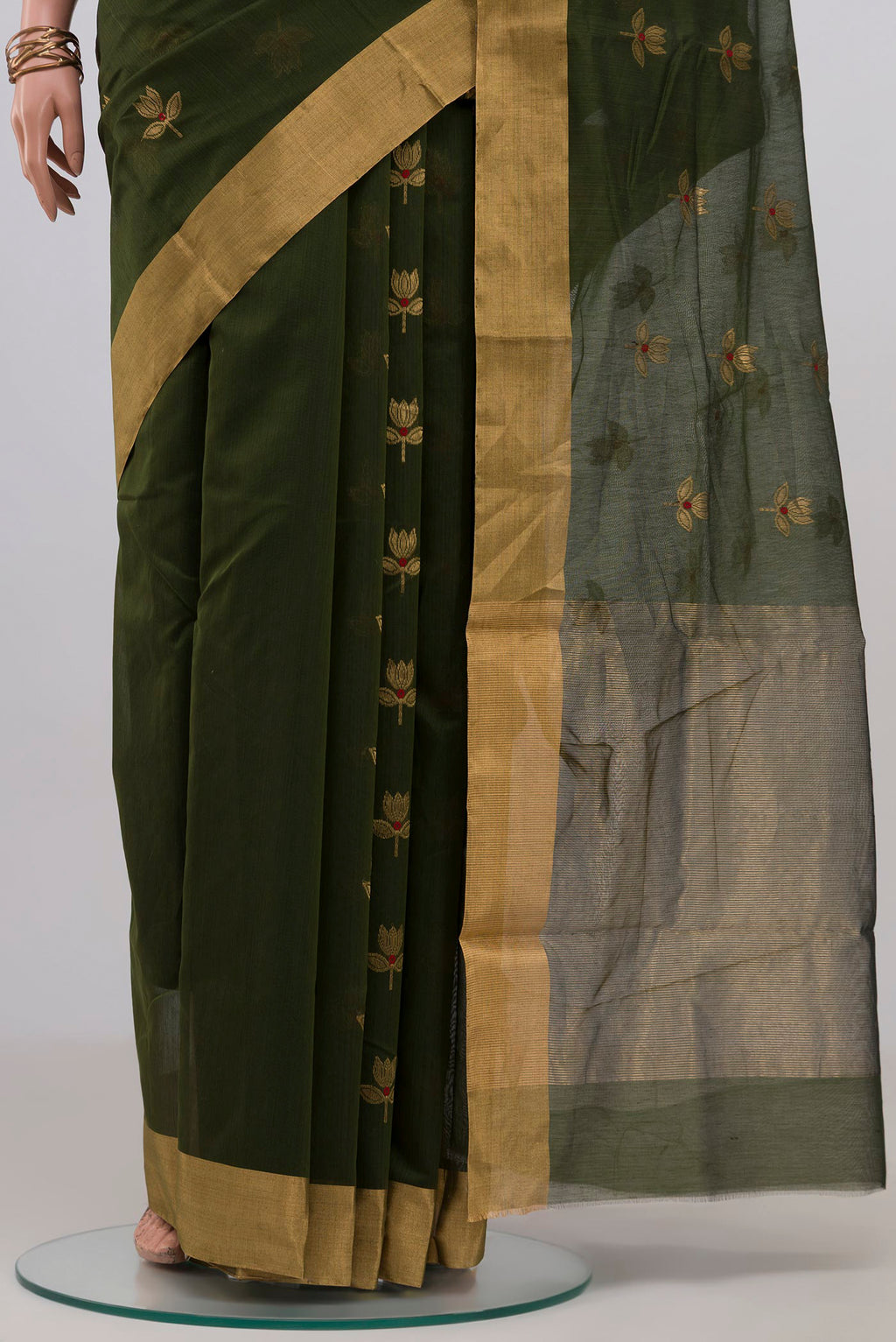 Pleats and pallu of Mehandi Green Chanderi Silk Cotton Saree with Zari Butta on the body and Zari Border. 