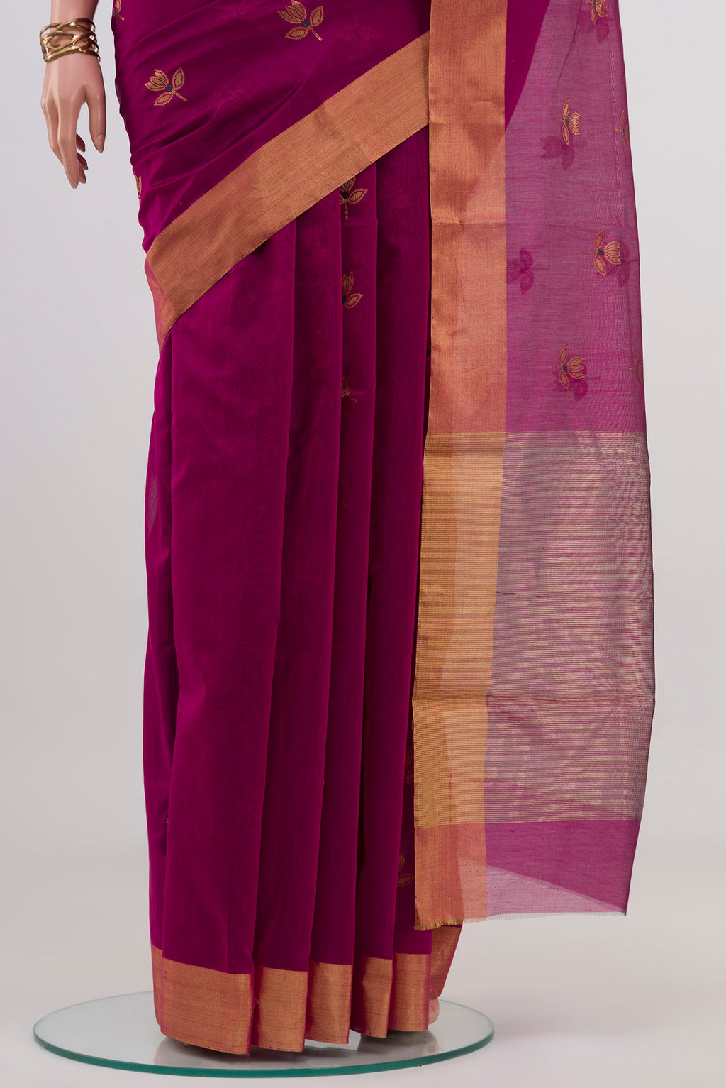 Pleats and pallu of Pink Chanderi Silk Cotton Saree with Zari Butta on the body and Zari Border. 