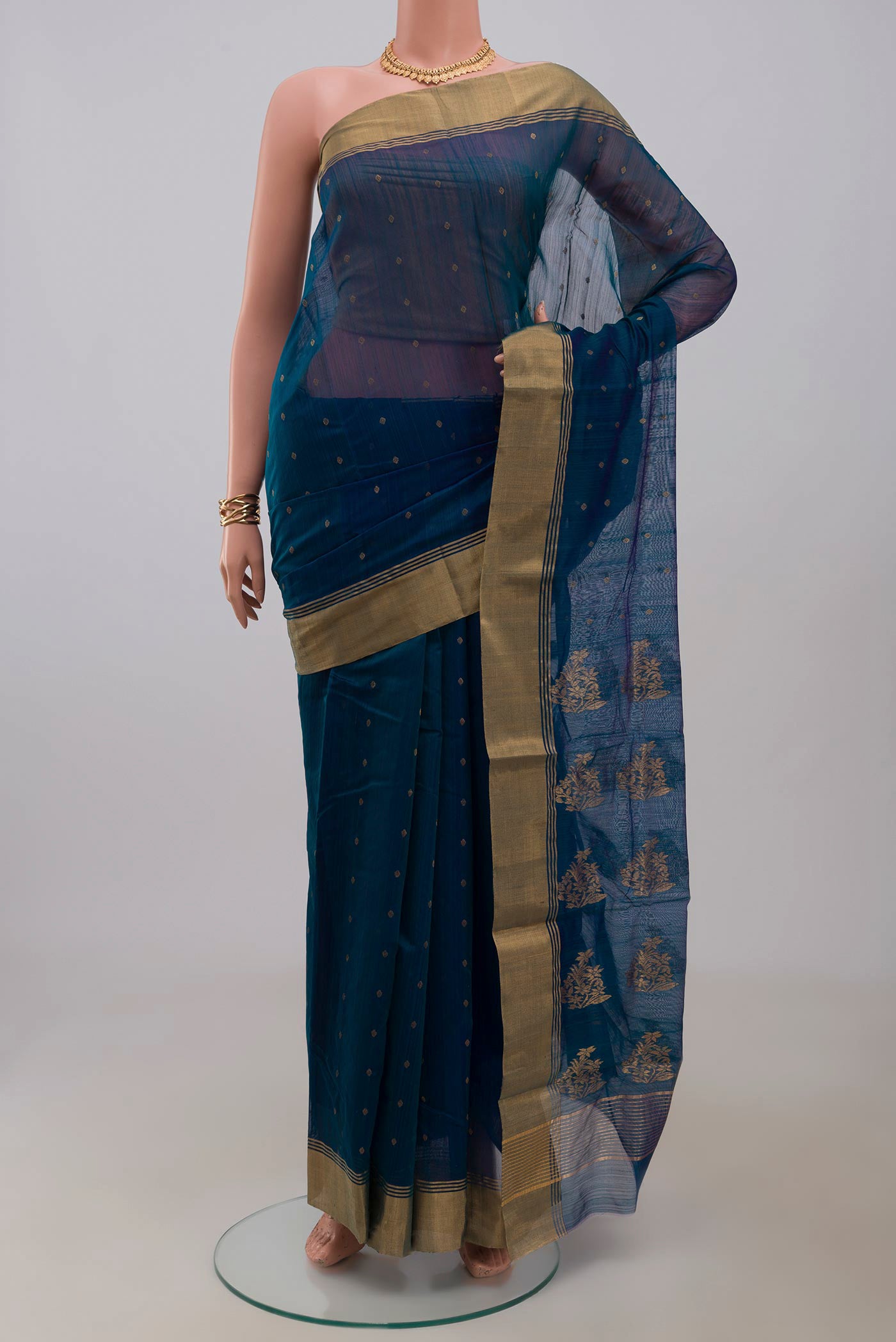 Blue Chanderi Silk Cotton Saree with Zari Butta on the body and Zari Border.  displayed on a mannequin