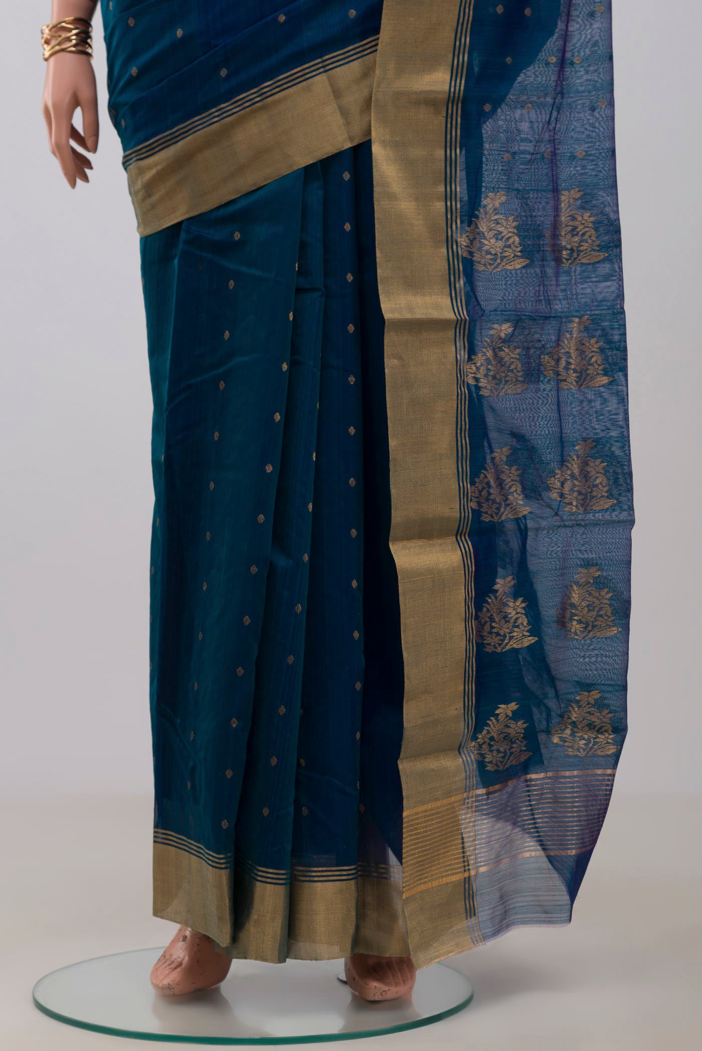 Pleats and pallu of Blue Chanderi Silk Cotton Saree with Zari Butta on the body and Zari Border. 