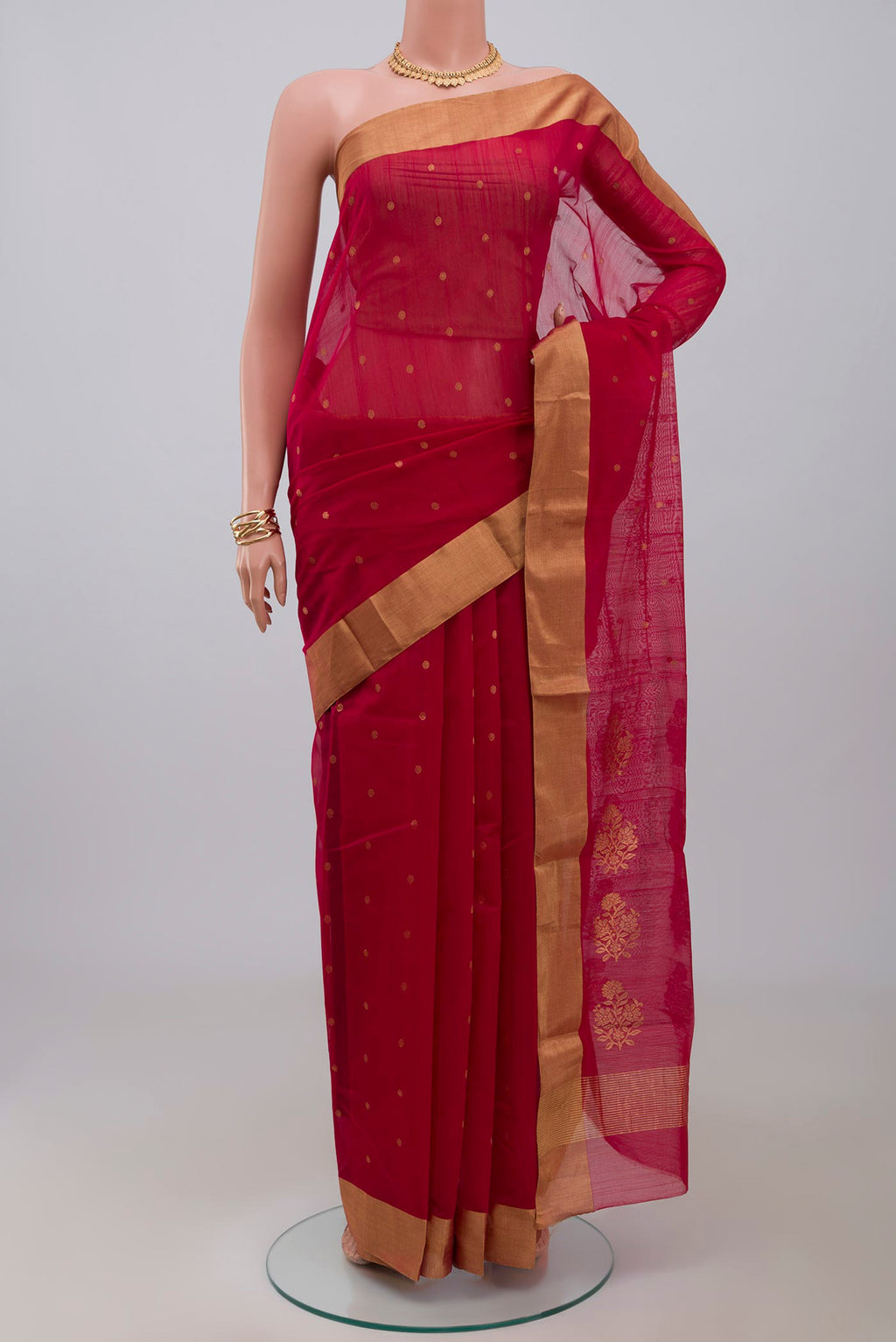 Pink Chanderi Silk Cotton Saree with Zari Butta on the body and Zari Border.  displayed on a mannequin