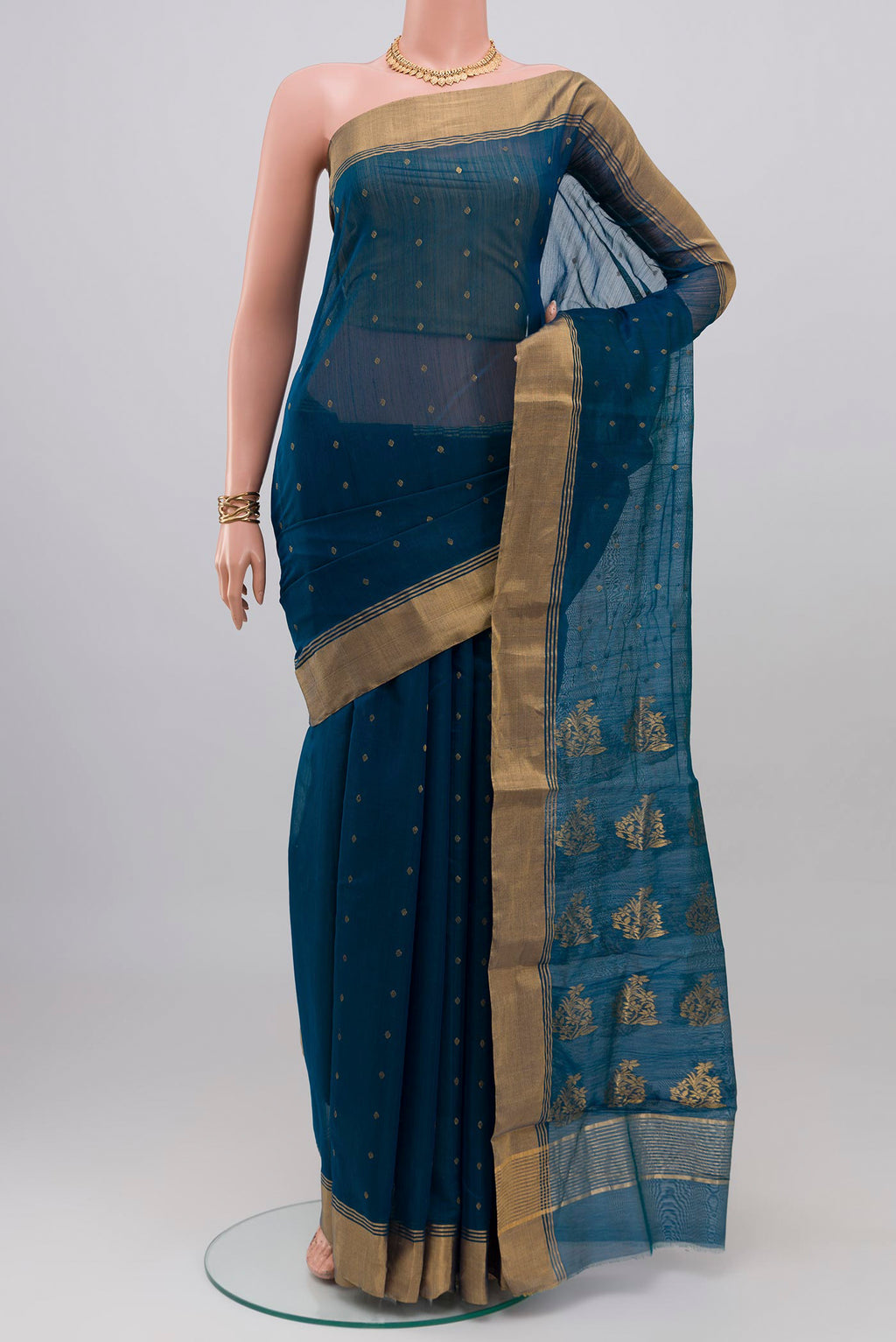 Blue Chanderi Silk Cotton Saree with Zari Butta on the body and Zari Border.  displayed on a mannequin