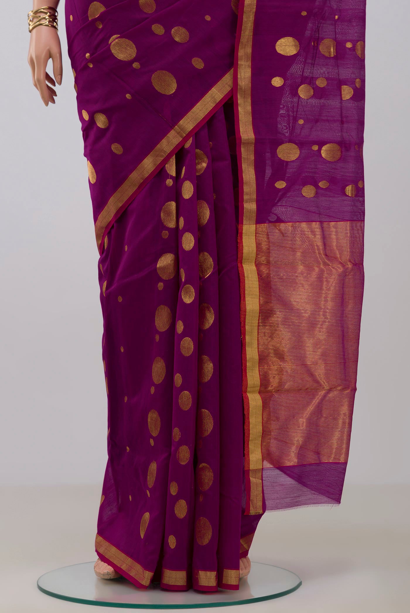Pleats and pallu of Magenta Chanderi Silk Cotton Saree with Zari Butta on the body and Zari Border. 