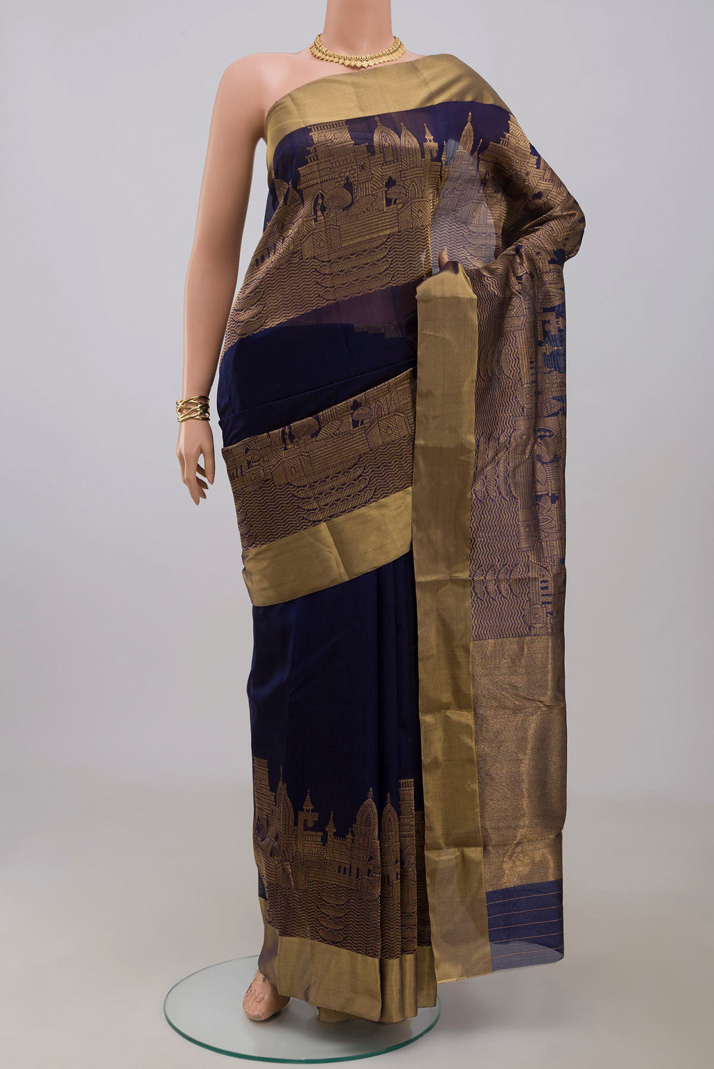 Blue Chanderi Silk Cotton Saree with Plain Body and Zari Border.  displayed on a mannequin