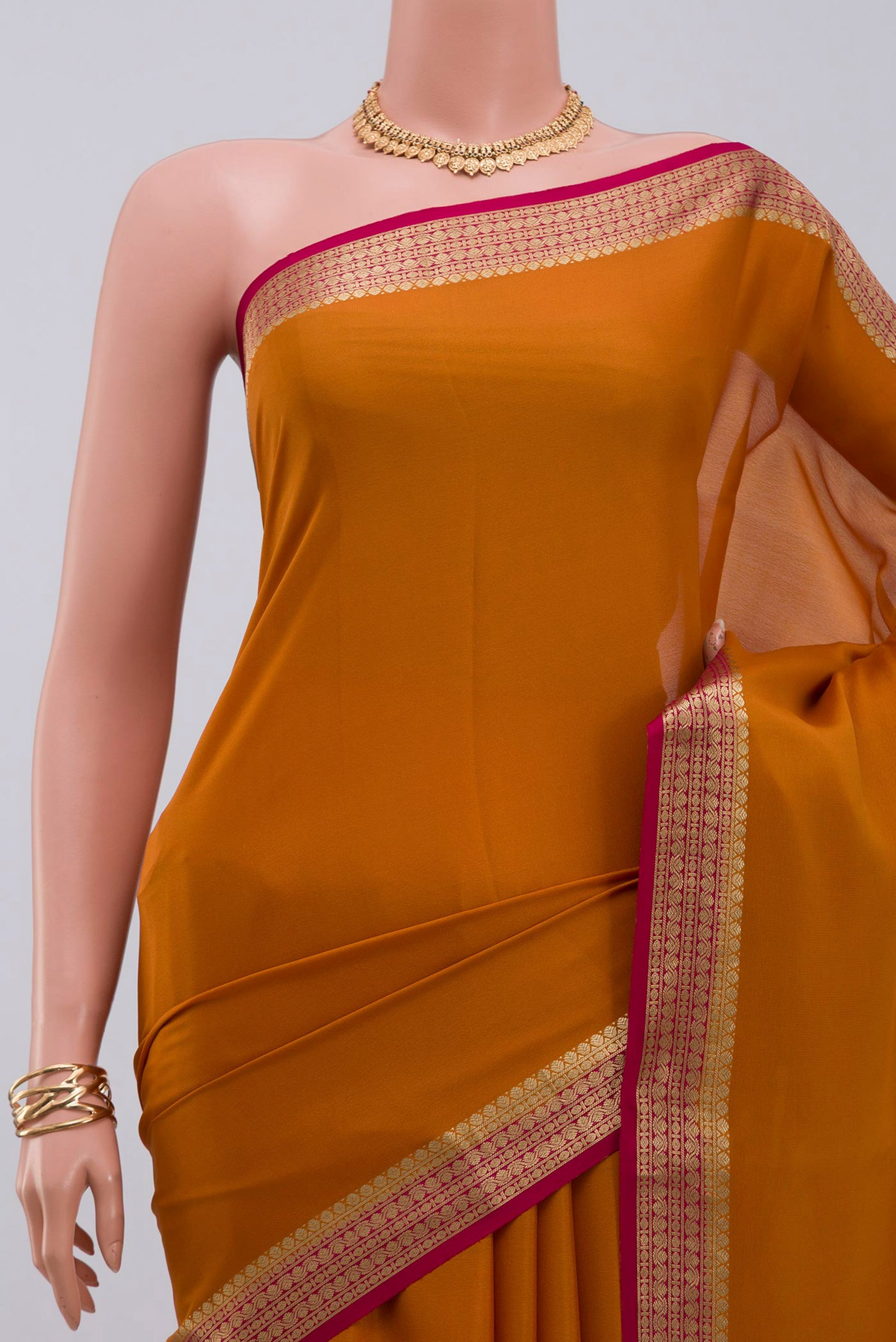 Border image of Yellow Mysore Crepe Saree with Plain Body and Zari Border. 