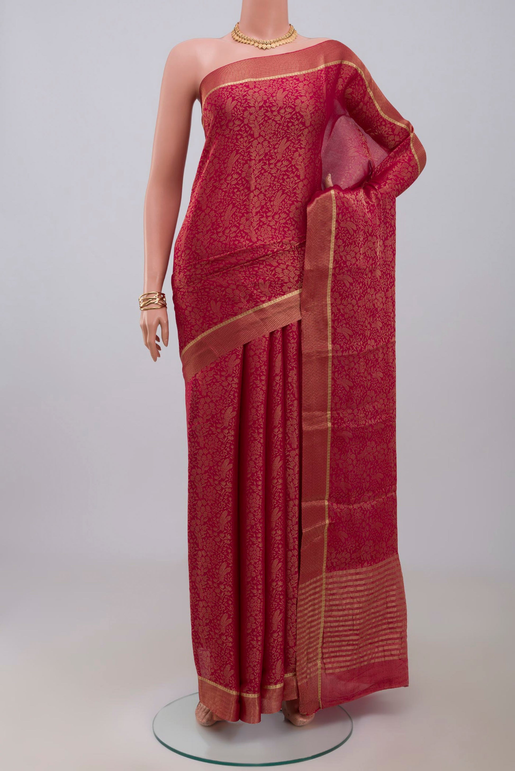 Pink Mysore Georgette Saree with Zari Brocade on the body and Zari Border.  displayed on a mannequin