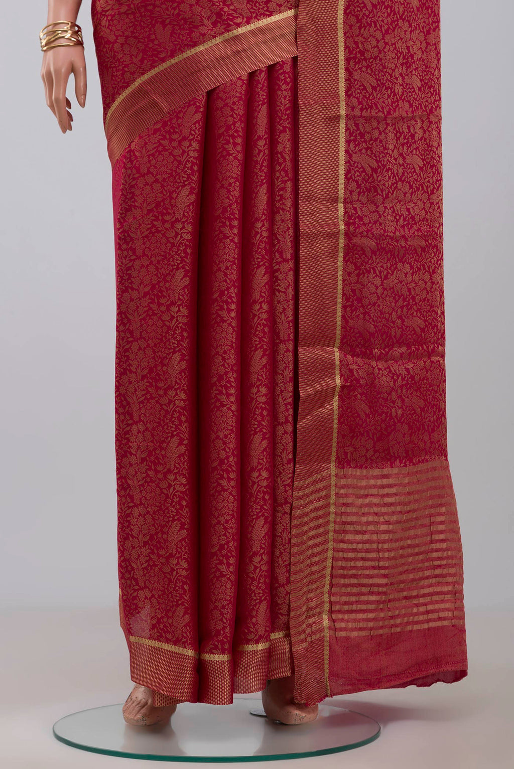 Pleats and pallu of Pink Mysore Georgette Saree with Zari Brocade on the body and Zari Border. 