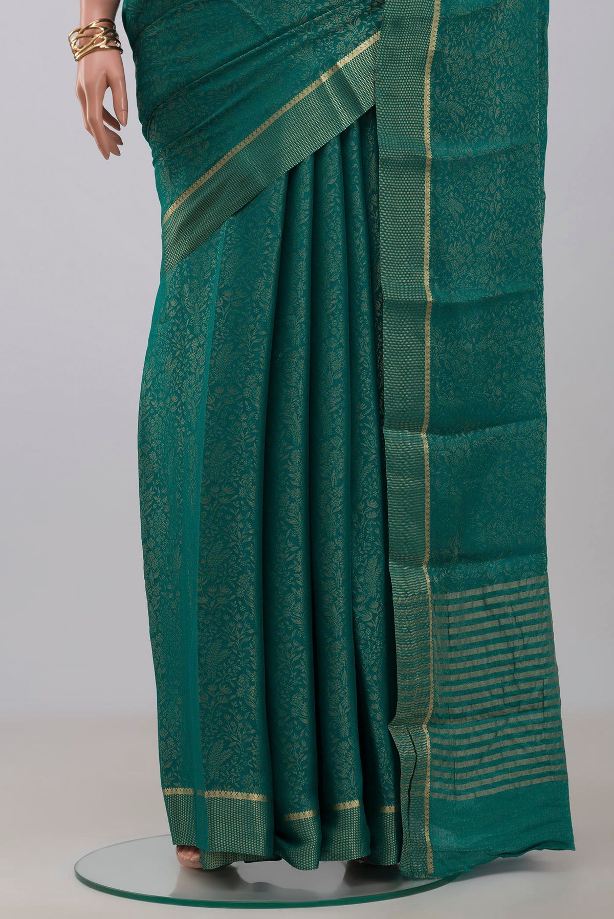 Pleats and pallu of Blue Georgette Saree with Fancy on the body and Fancy Border. 