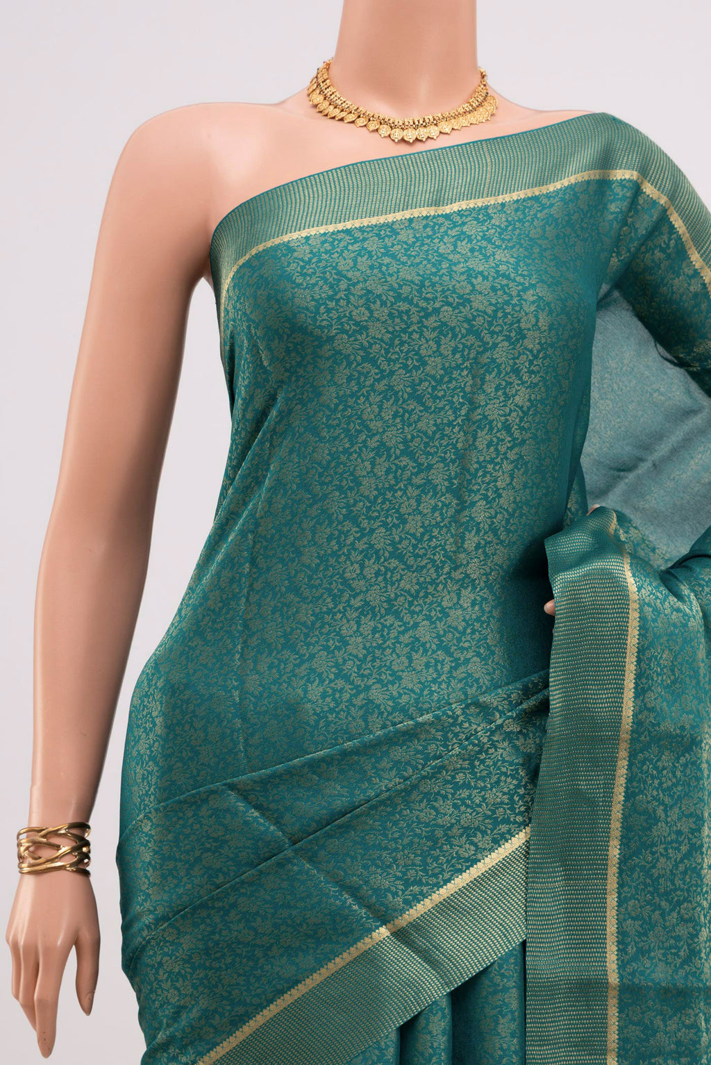 Border image of Peacock Blue Mysore Georgette Saree with Fancy on the body and Zari Border. 