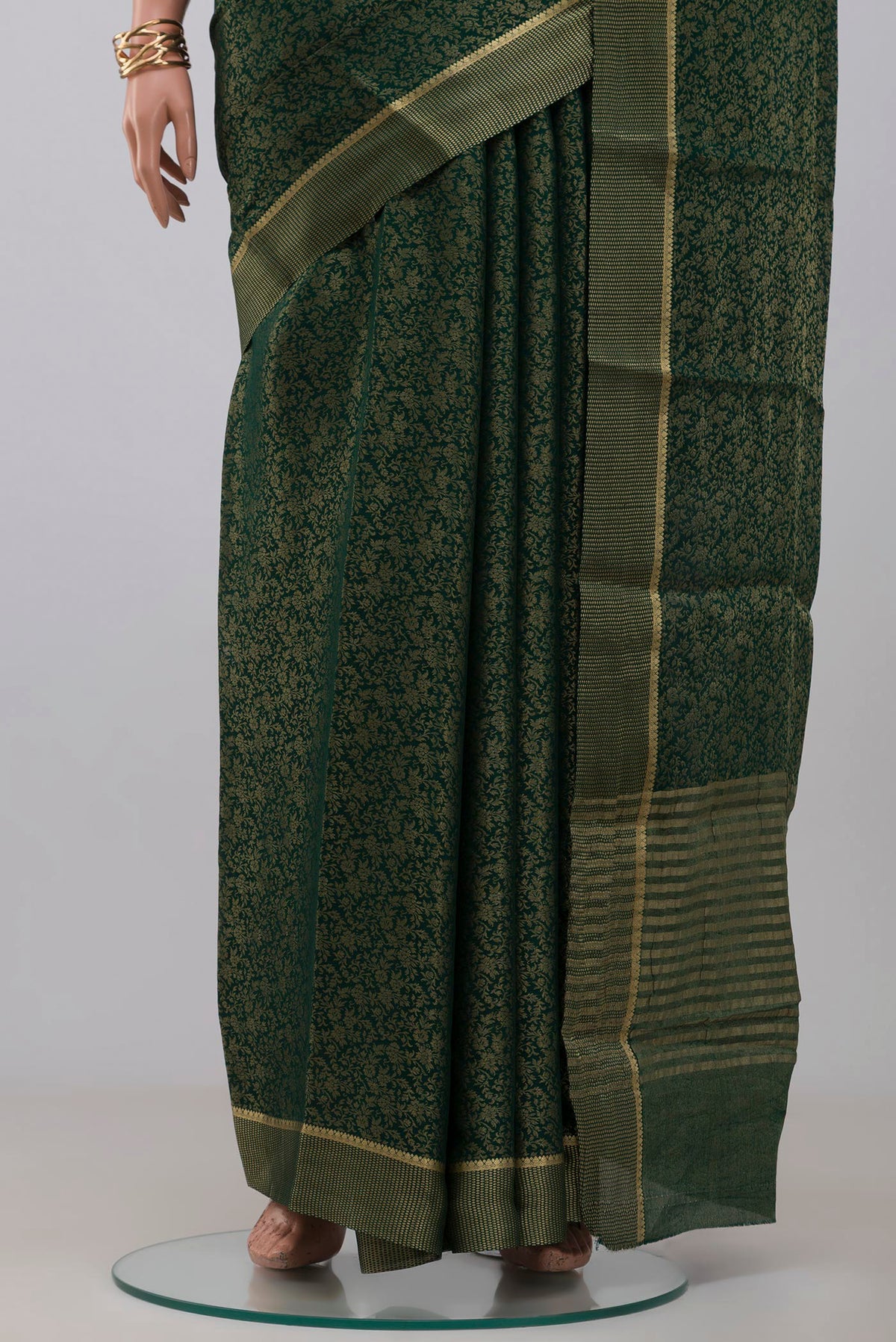 Pleats and pallu of Green Mysore Georgette Saree with Fancy on the body and Fancy Border. 