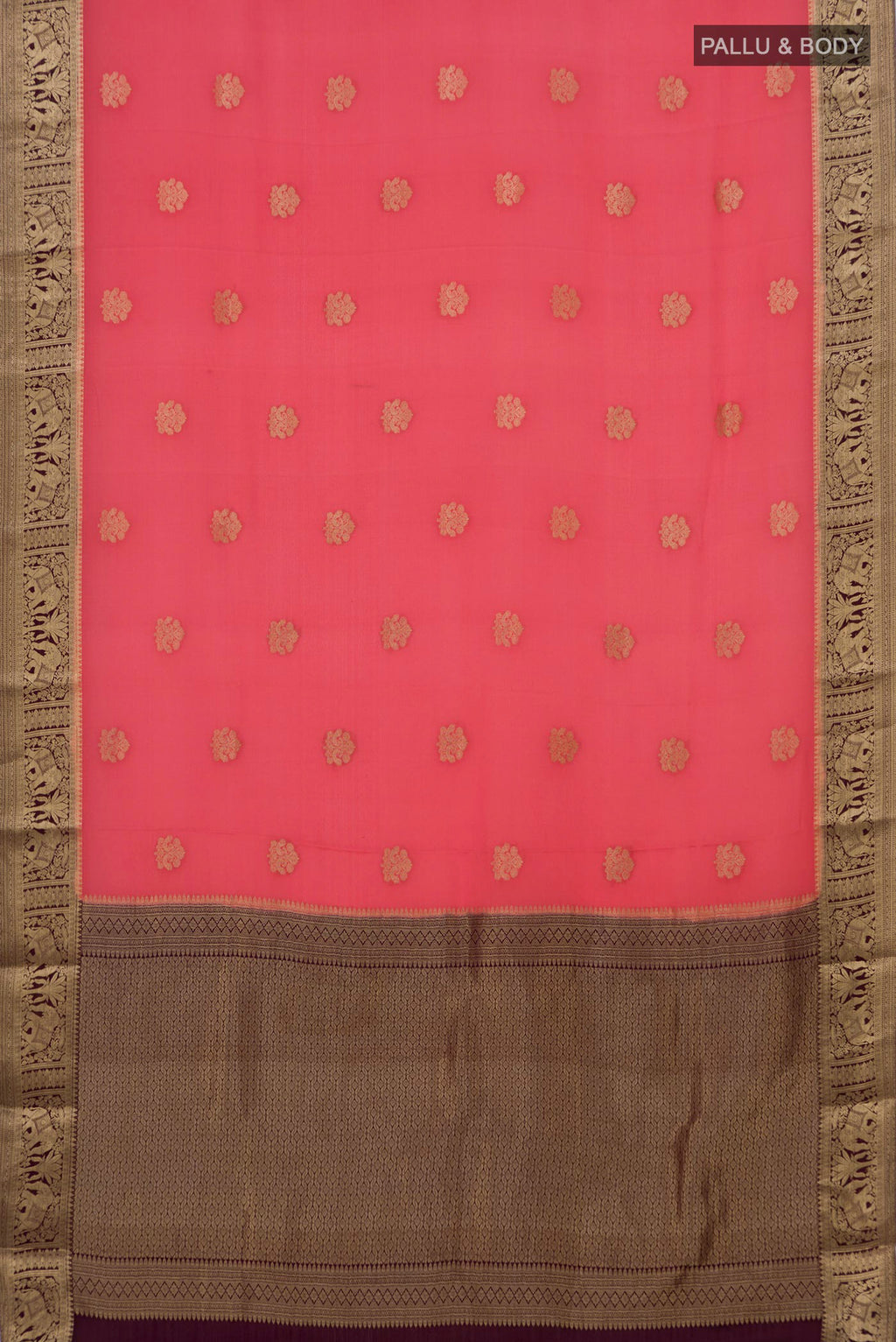Flat view of Coral Mysore Crepe Saree with Zari Butta on the body and Zari Border. 