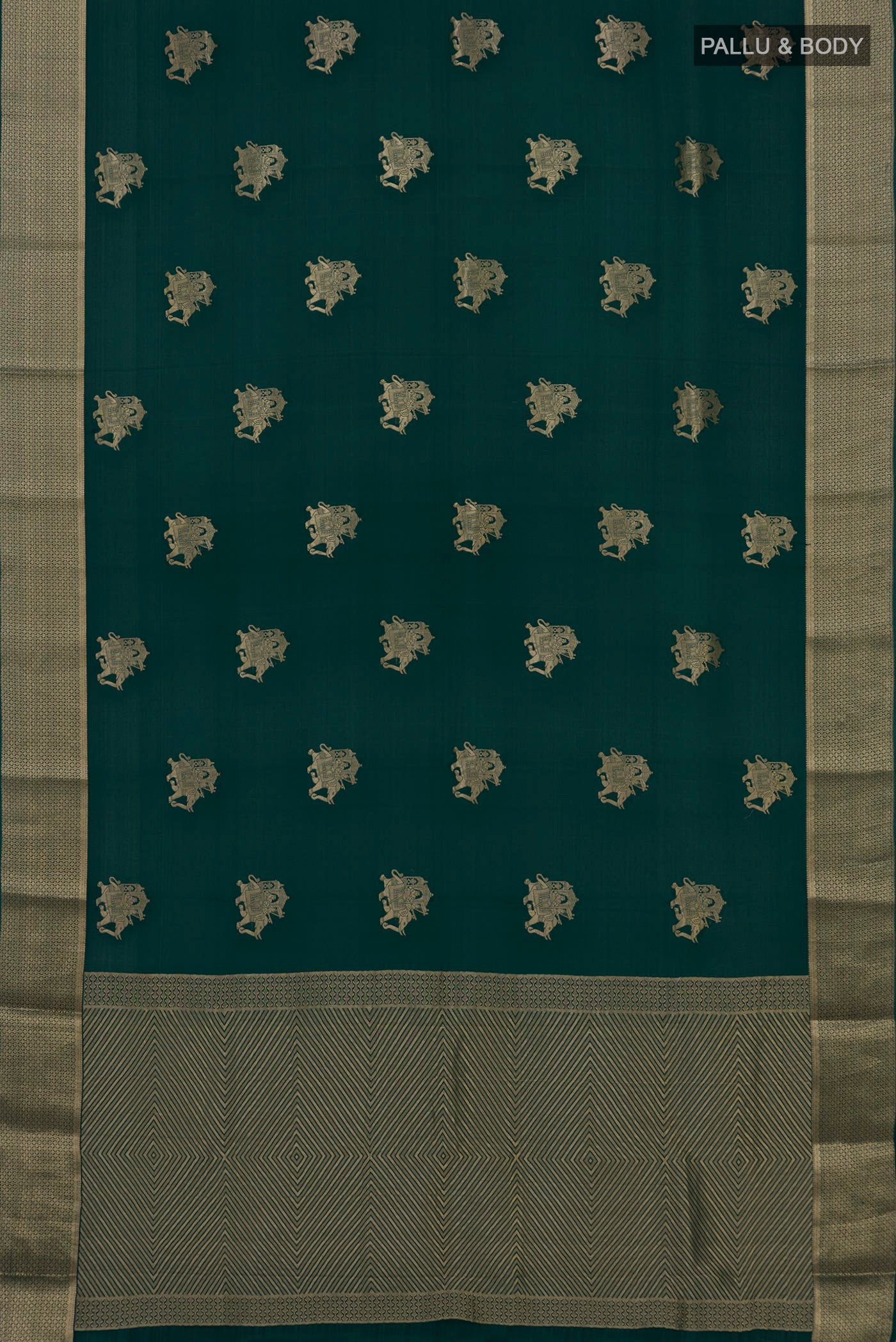 Flat view of Bottle Green Mysore Crepe Saree with Zari Butta on the body and Zari Border. 
