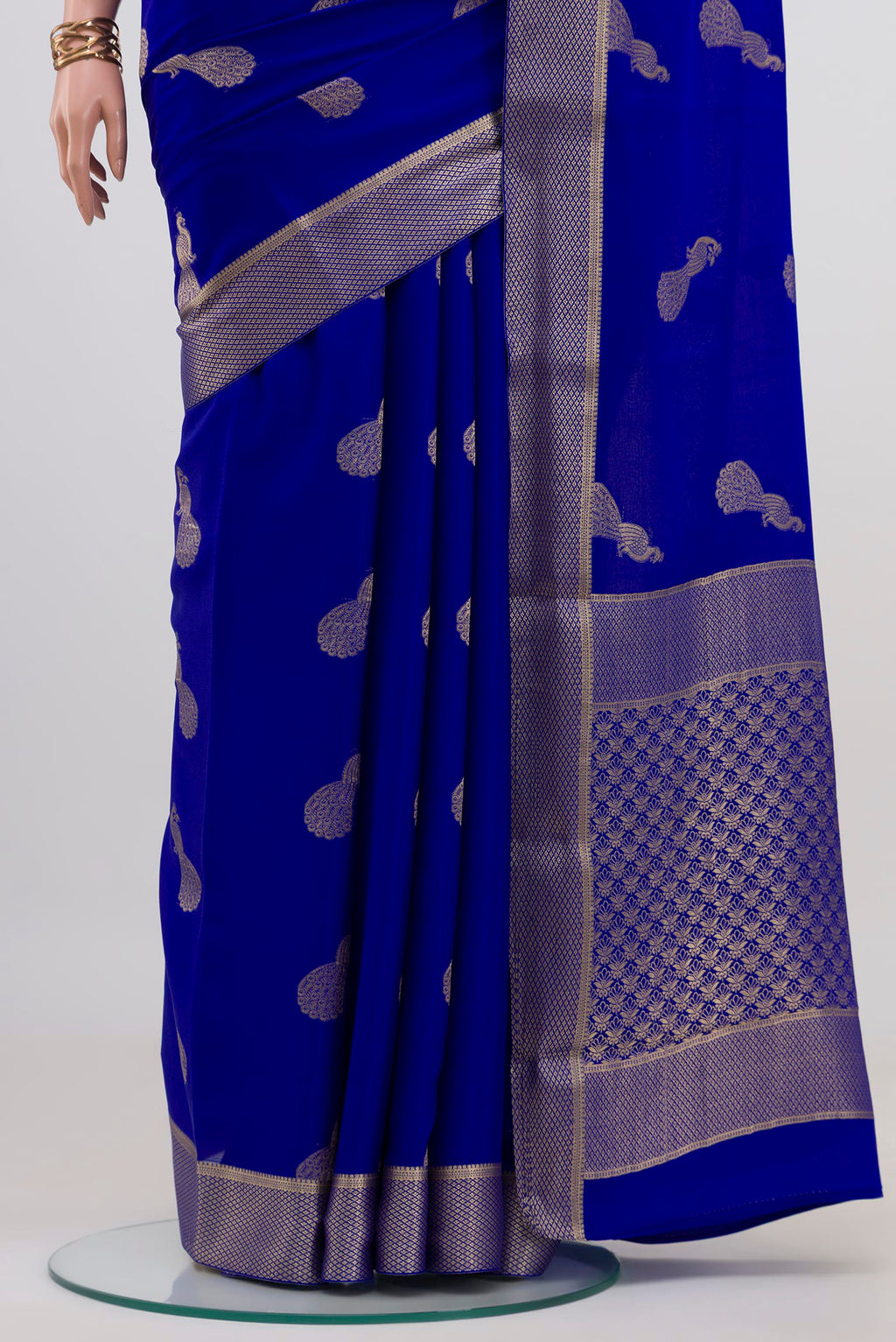 Pleats and pallu of Royal Blue Mysore Crepe Saree with Zari Butta on the body and Zari Border. 