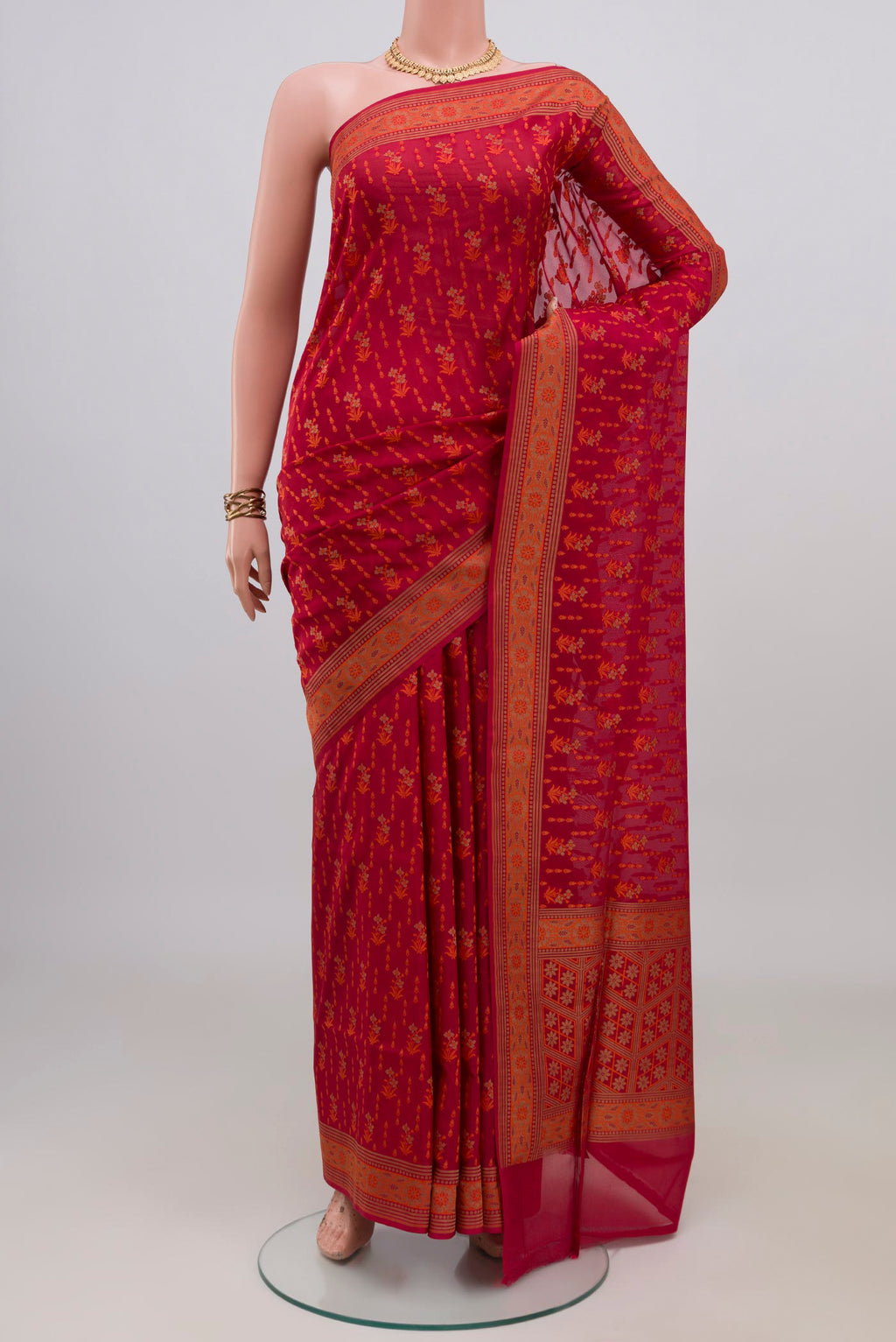 Pure Silk Red Banarasi Saree with Thread Butta on the body and Zari Border.  displayed on a mannequin