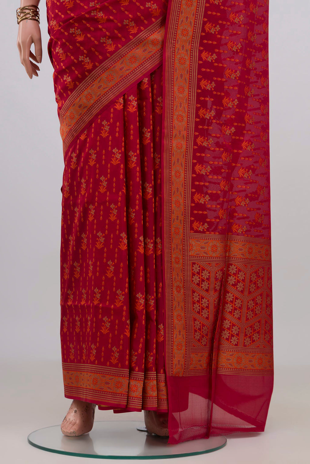 Pleats and pallu of Pure Silk Red Banarasi Saree with Thread Butta on the body and Zari Border. 