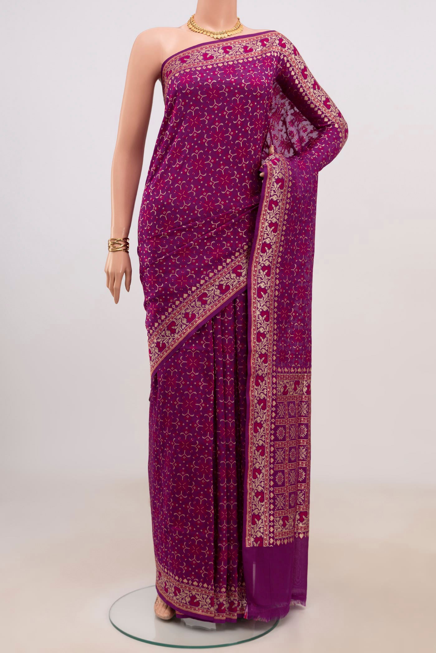 Purple Banarasi Saree with Fancy on the body and Fancy Border.  displayed on a mannequin
