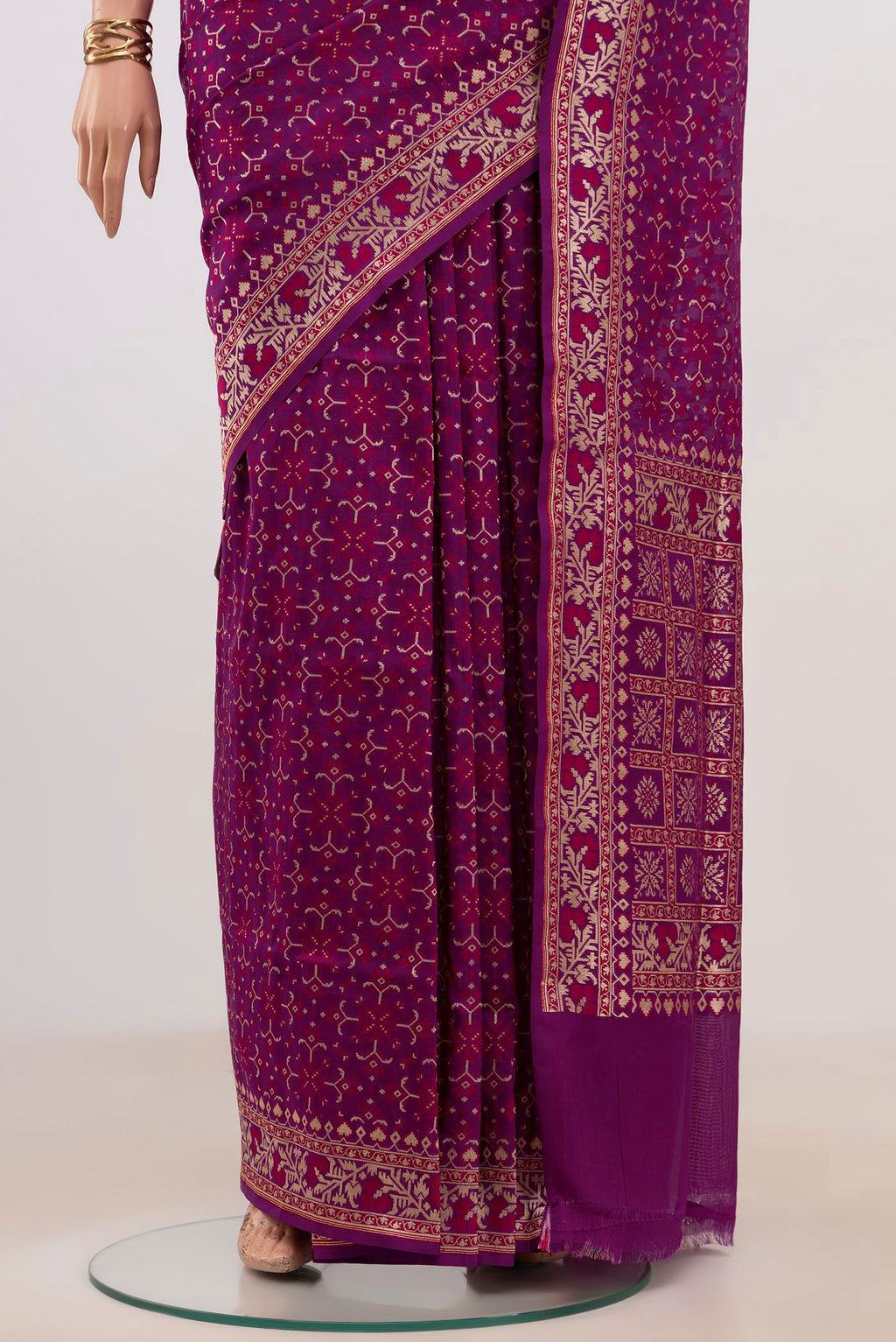 Pleats and pallu of Purple Banarasi Saree with Fancy on the body and Fancy Border. 