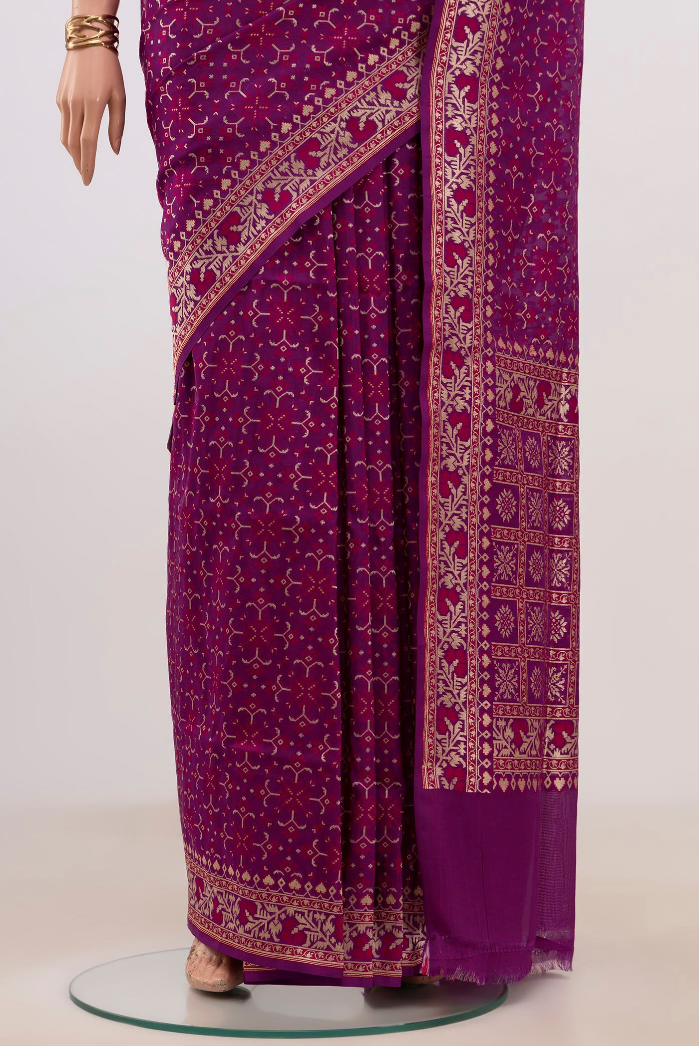 Pleats and pallu of Purple Banarasi Saree with Fancy on the body and Fancy Border. 
