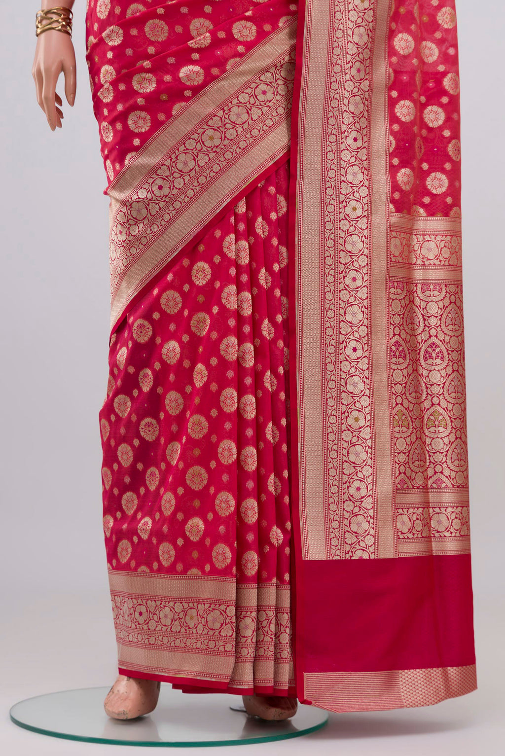 Pleats and pallu of Pink Banarasi Silk Saree with Zari And Thread Butta on the body and Zari Border. 