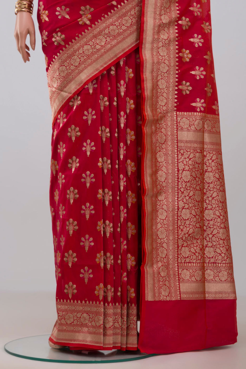 Pleats and pallu of Pink Banarasi Saree with Zari Butta on the body and Fancy Border. 