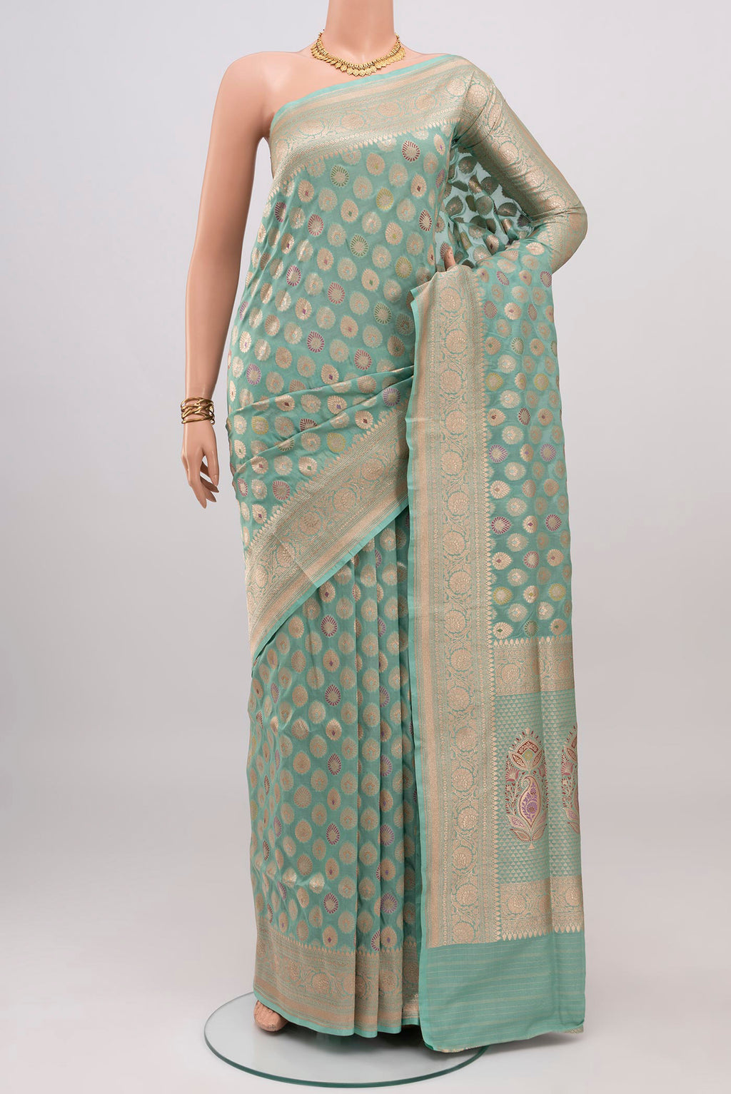 Light Blue Banarasi Silk Saree with Zari Brocade on the body and Zari Border.  displayed on a mannequin