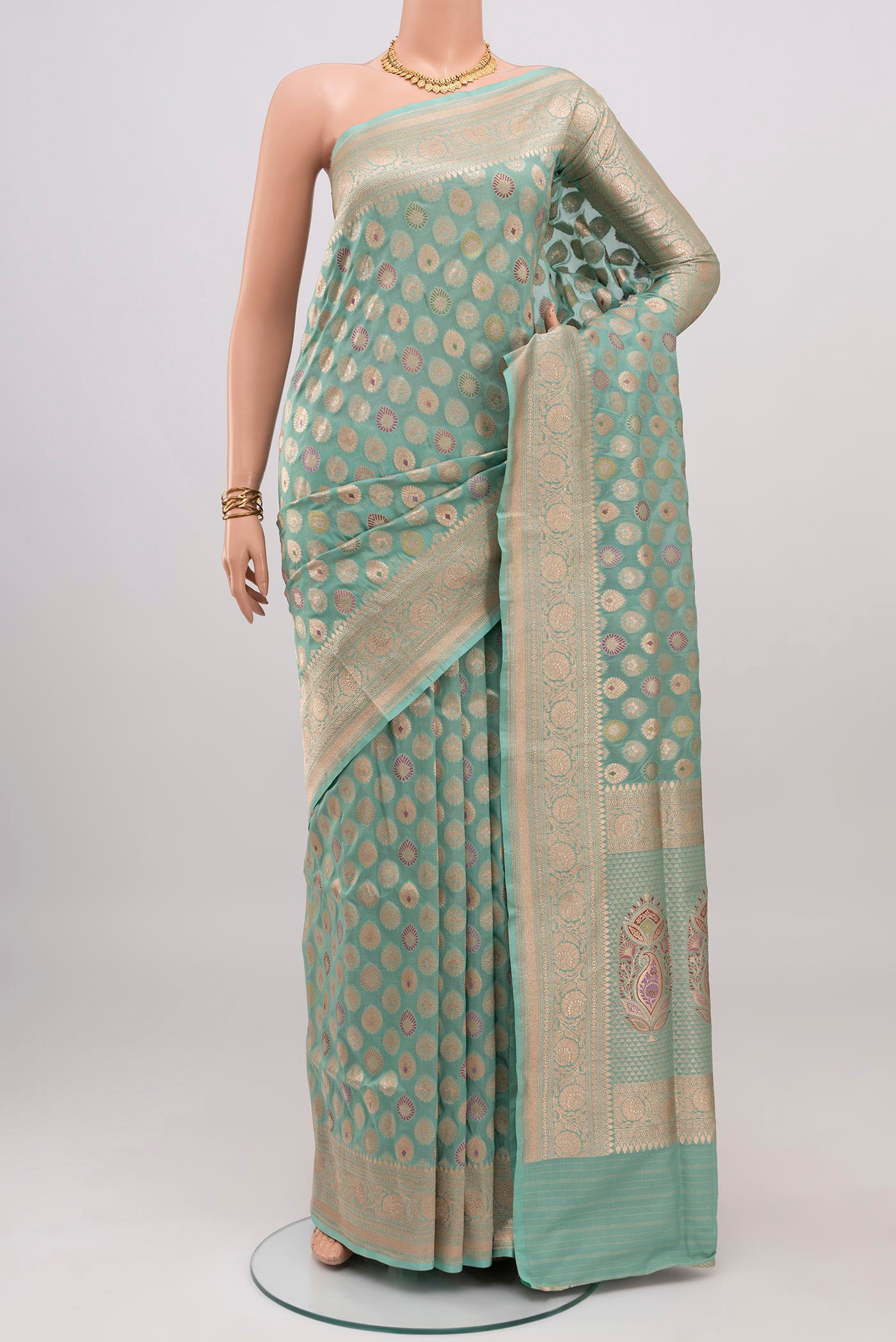 Light Blue Banarasi Silk Saree with Zari Brocade on the body and Zari Border.  displayed on a mannequin