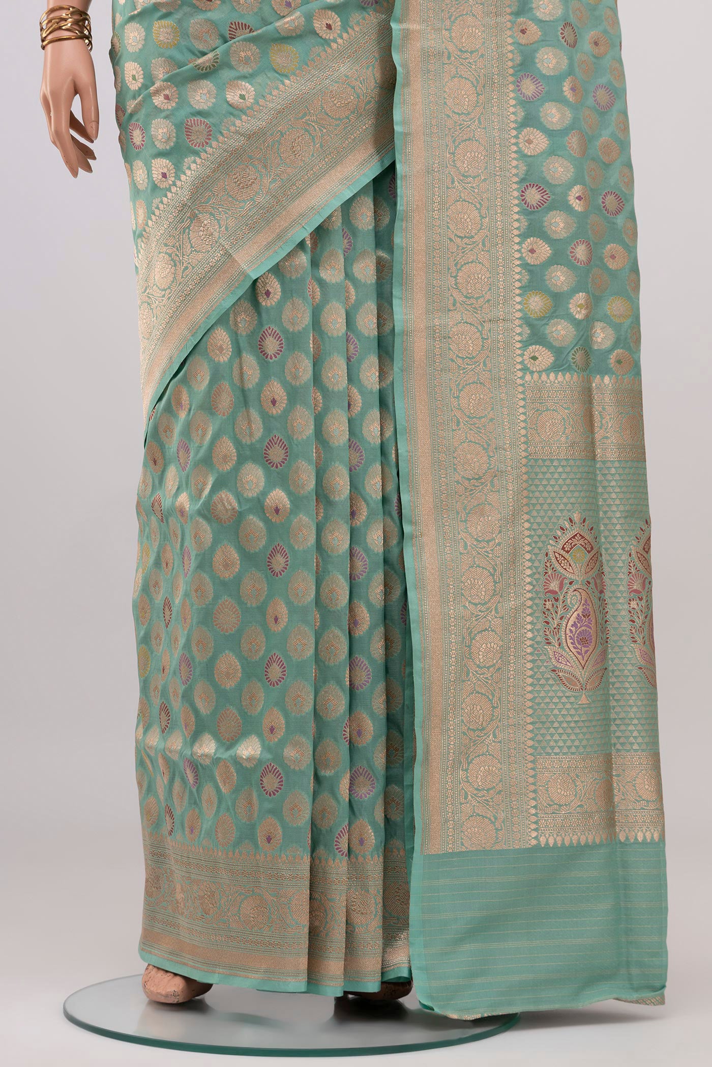 Pleats and pallu of Light Blue Banarasi Silk Saree with Zari Brocade on the body and Zari Border. 